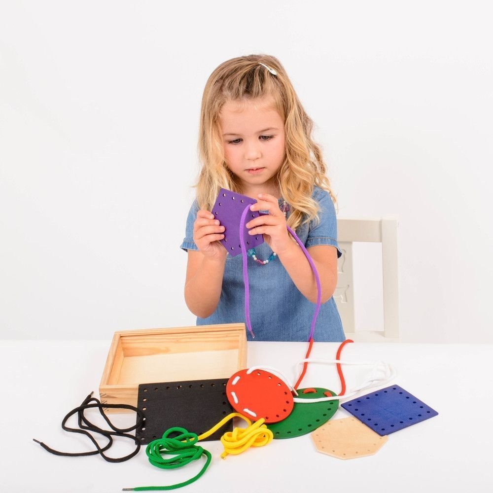 16 Piece Jumbo Threading Set,The 16 Piece Jumbo Threading Shapes Set is a beautifully crafted educational tool designed to engage young learners in the fundamental concepts of geometry while simultaneously enhancing their fine motor skills and hand-eye coordination. The 16 Piece Jumbo Threading Set is made from high-quality wood, this set includes a collection of geometric shapes along with matching threads, all contained within a wooden box for easy storage and transport. 16 Piece Jumbo Threading Set Compo