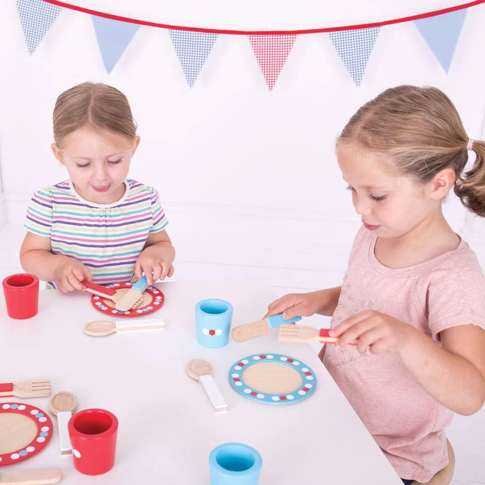 20 Piece Wooden Dinner Service Set,20 Piece Wooden Dinner Service Set: Endless Imaginative Play Budding young cooks can host their own dinner and tea parties with the 20 Piece Wooden Dinner Service Set. This brightly coloured wooden set is perfect for pretend play, allowing children to cook up amazing meals and enjoy endless play possibilities. Features and Benefits: Engaging and Imaginative Play Comprehensive Set: The toy tea set comes with 20 pieces in total, including 4 wooden plates, cups, knives, forks