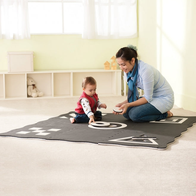 3D Creative Black And White Mats,The 3D Creative Black and White Mats offer an innovative and stimulating play environment for young children. This set of nine square mats is designed with interlocking edges, allowing for the creation of numerous shapes and configurations that can adapt to various play and learning activities. The striking black and white design, printed on both sides of five mats with a variety of patterns, not only enhances visual appeal but also provides visual stimulation crucial for ea