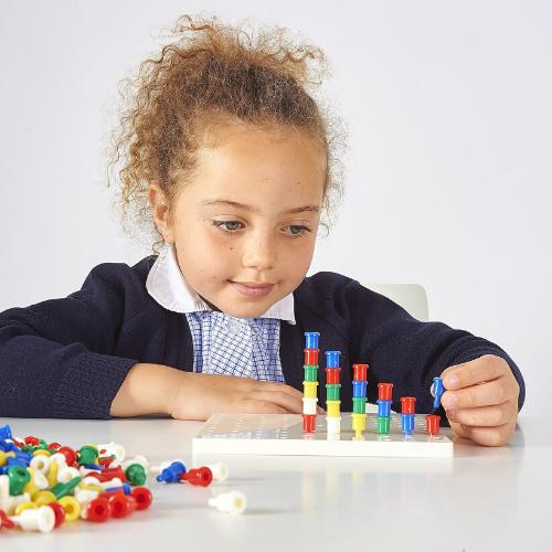 5 Peg Boards And Pegs,This versatile set of peg boards and pegs offers hours of fun learning and developing essential skills. The 5 Peg Boards and Pegs comes complete with 5 white peg boards and 1000 colourful pegs in 5 colours: red, blue, yellow, green and white. Each peg board has 100 holes arrange over a 10 x 10 grid. The pegs boards and pegs allow children to develop a variety of basic mathematical skills including colour recognition, making shapes, patterning and understanding symmetry as they stack th