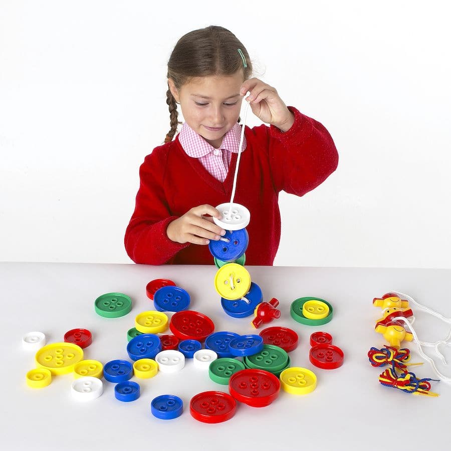 54 Pack Giant Threading Buttons,The 54 Pack Giant Threading Buttons set is an innovative and engaging tool designed to enhance early developmental skills in children. This Giant Threading Buttons set, with its wide array of giant buttons in different shapes, colours, and sizes, provides a hands-on learning experience that encourages children to explore the fundamentals of sequencing, sorting, and tactile discrimination. Key Features of the 54 Pack Giant Threading Buttons: Fine Motor Skill Development: Handl