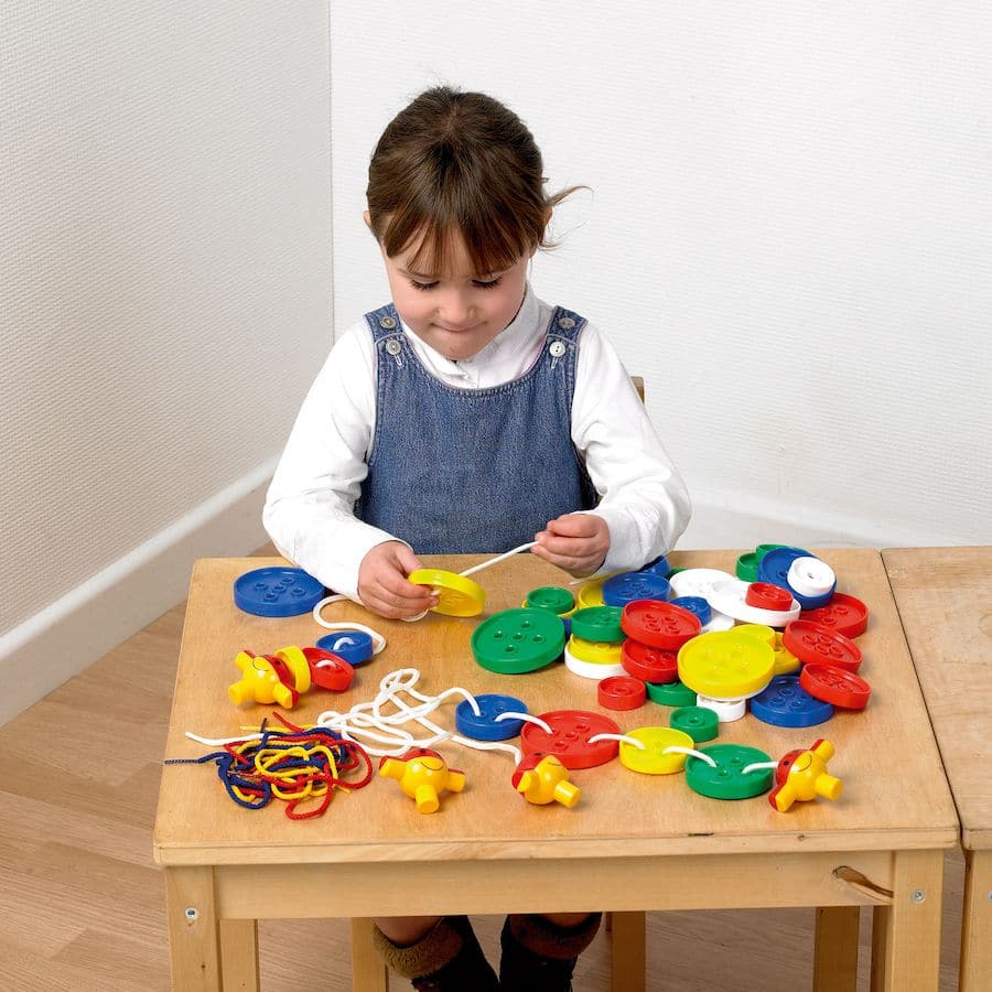 54 Pack Giant Threading Buttons,The 54 Pack Giant Threading Buttons set is an innovative and engaging tool designed to enhance early developmental skills in children. This Giant Threading Buttons set, with its wide array of giant buttons in different shapes, colours, and sizes, provides a hands-on learning experience that encourages children to explore the fundamentals of sequencing, sorting, and tactile discrimination. Key Features of the 54 Pack Giant Threading Buttons: Fine Motor Skill Development: Handl