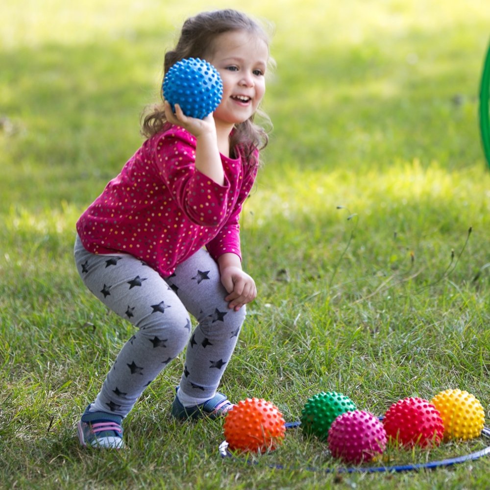 6 Pack Easy Grip Balls,The Easy Grip Balls pack offers a delightful assortment of six textured sensory balls, each designed to enhance tactile experiences and fine motor skills among young children. Measuring 11cm in diameter, these balls are perfectly sized for little hands to hold, grip, and explore. The distinctive hedgehog ball texture, with its knobbly bumps, not only captivates the curiosity of children but also provides a unique soft touch that is different from traditional smooth balls. Key Features