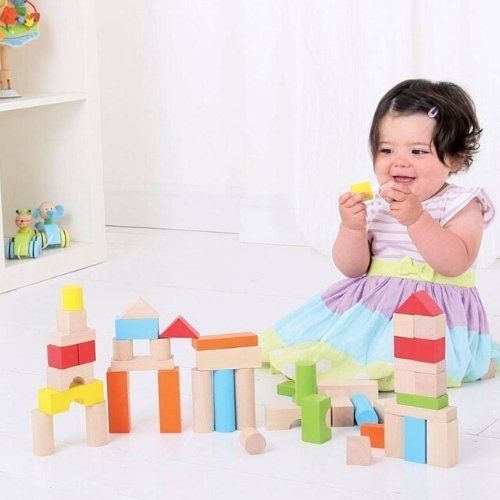 80 Wooden Blocks,The 80 Wooden Building Blocks Set is an exquisite collection designed to spark creativity and enhance developmental skills in young children. This set, featuring a vibrant array of colours and an assortment of shapes, is meticulously crafted to foster imagination, allowing children to construct towers, walls, castles, and anything else their hearts desire. The blocks are painted with child-friendly paints, ensuring safety during play, and their chunky design makes them perfect for little ha