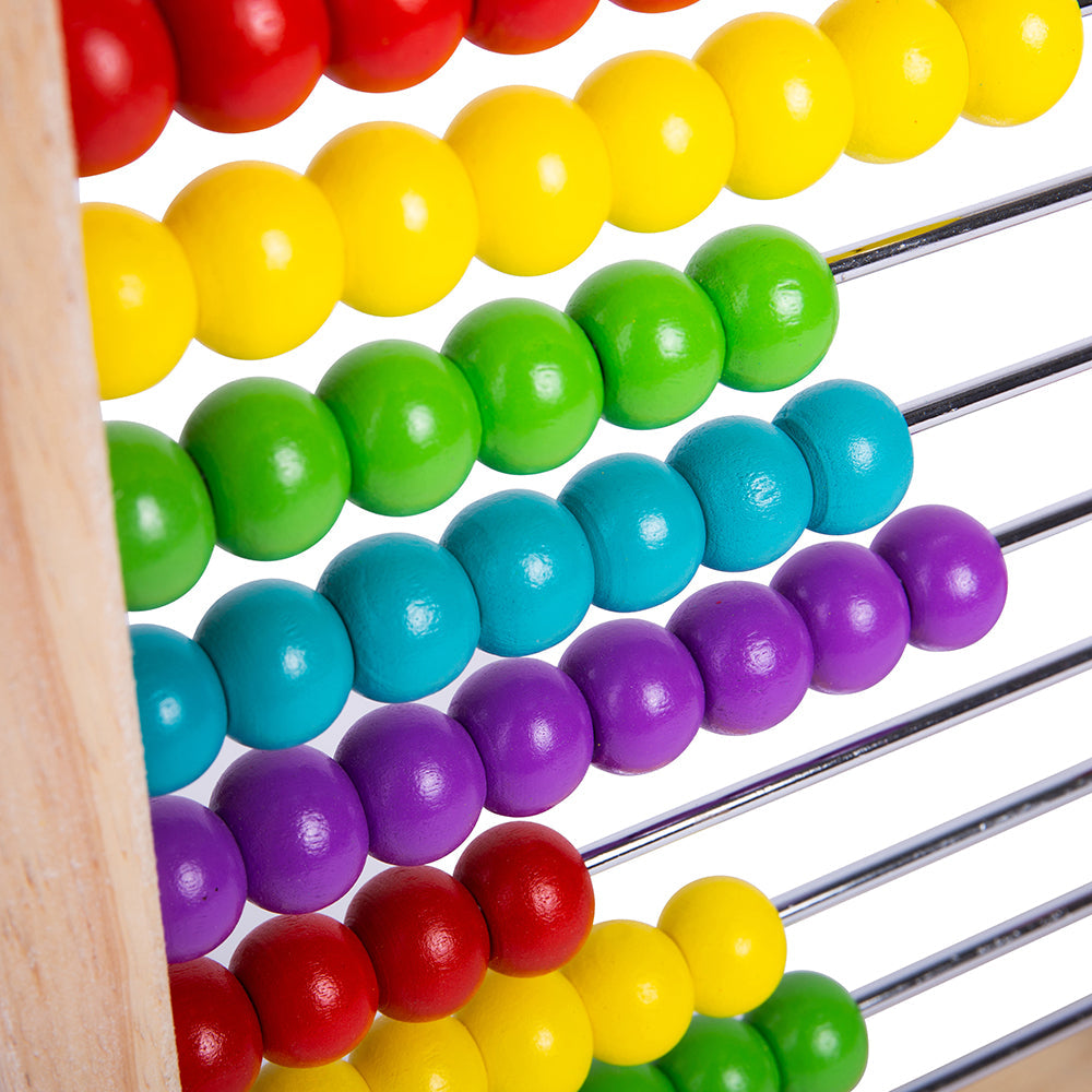 Abacus,Wooden Abacus: A Classic Educational Essential With its bright beads and sturdy wooden frame, this traditional Wooden Abacus is an educational playroom essential. Perfect for use at home, in nurseries, or even in the classroom, this classic toy encourages interactive and engaging learning. Features and Benefits: Educational and Interactive Maths Skills: The wooden abacus encourages numeracy skills, helping children learn to count, add, and subtract. Patterning and Colour Recognition: As little hands 