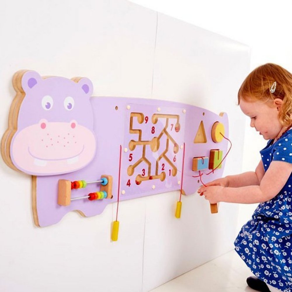 Activity Wall Panel Hippo,The Activity Wall Panel Hippo is not only Visually Stunning for any setting but it also provides a range of interesting manipulative activities for a single child or group of children playing and exploring together. The Activity Wall Panel Hippo is excellent for the development of hand-eye coordination, finger control and fine motor skills. The Activity Wall Panel Hippo also provides problem solving challenges appropriate to young children whilst engaging children in conversations 