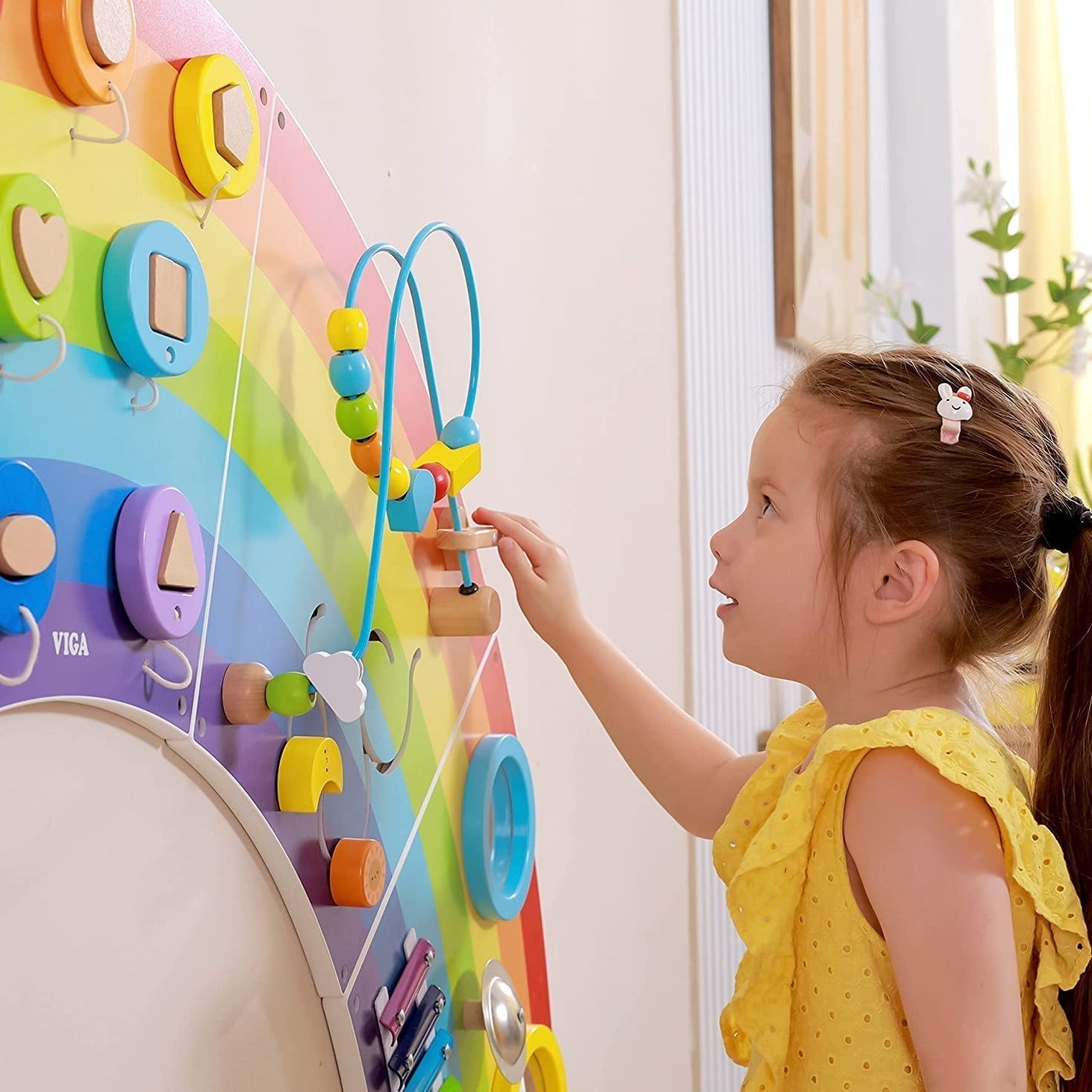 Activity Wall Panel Rainbow,The Activity Wall Panel Rainbow toy is ideal for the wall at home, waiting room, treatment rooms or in your nursery or school. The Activity Wall Panel Rainbow is Ideal for developing hand-eye co-ordination, finger control and fine motor skills. Wall fixings included. The Activity Wall Panel Rainbow also provides problem solving challenges appropriate to young children whilst engaging children in conversations about what they are doing. This activity wall provides a multi-sensory 