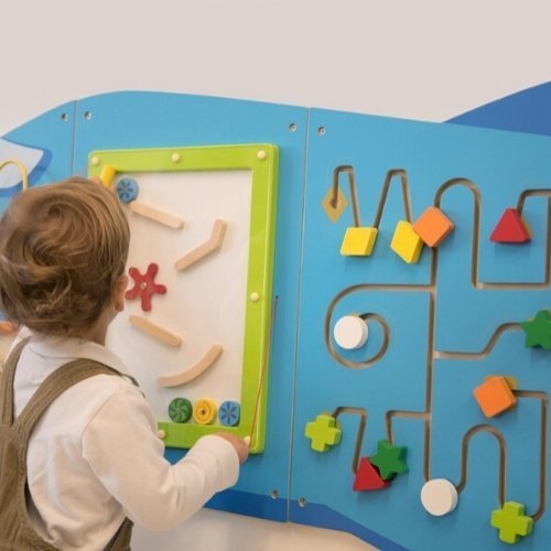 Aeroplane Activity Wall Panel,Aeroplane Activity Wall Panel Introduce your little ones to a world of interactive learning with the Aeroplane Activity Wall Panel. This engaging wall panel is made up of five distinct sections, each offering a unique set of manipulative activities designed to enhance hand-eye coordination and fine motor skills. Ideal for early learning environments, this activity wall panel is perfect for promoting physical, cognitive, and social development in young children. Aeroplane Activi