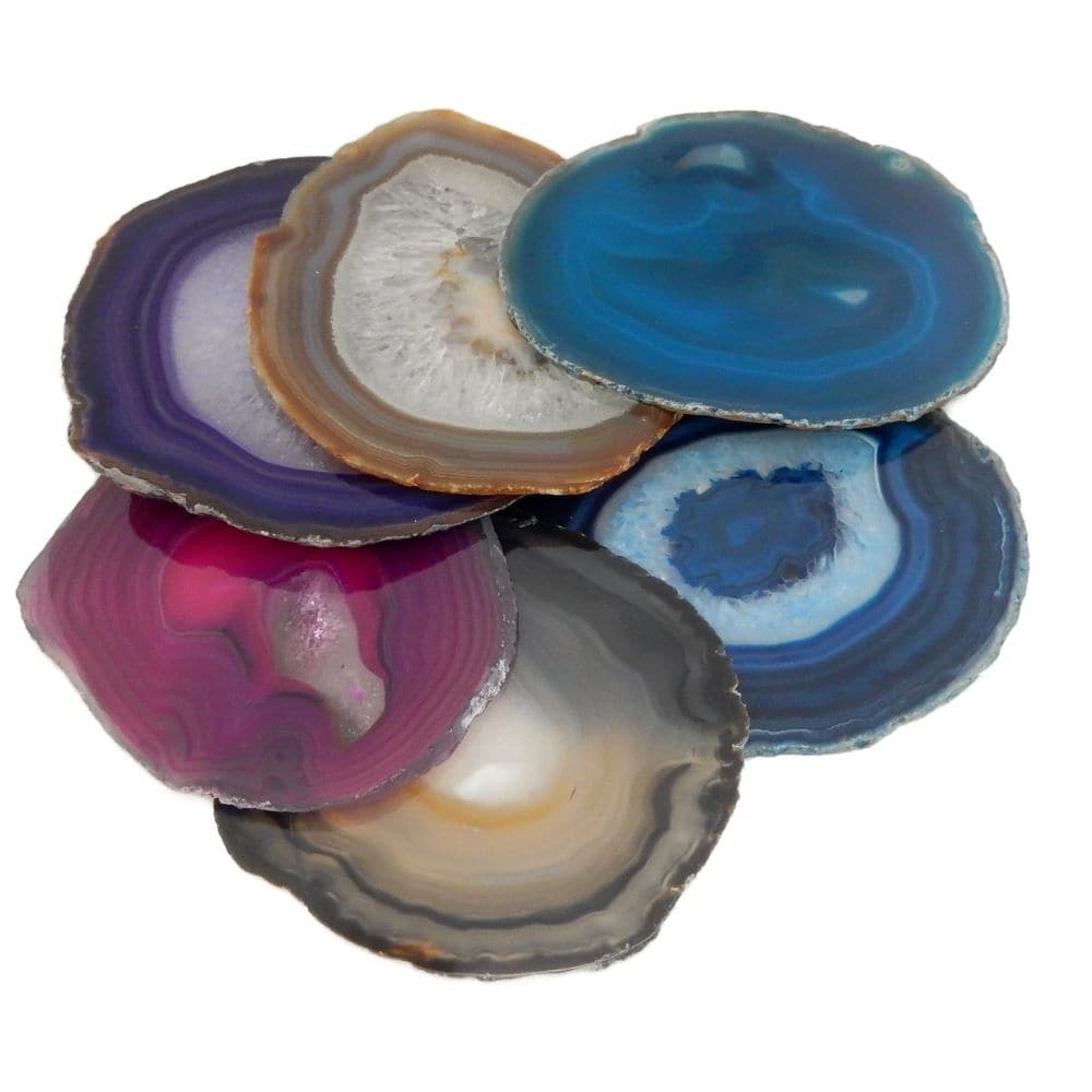 Agate Slices Pack Of 6,These Agate Slices are not only visually stimulating but also offer a tactile experience. Kids can explore the smooth texture and varying sizes of each slice, engaging their sense of touch and promoting sensory play.Being thin slices, these agate crystals allow light to pass through them, creating a mesmerizing effect when placed on a light box. Watch as the vibrant colours glow and illuminate, providing a captivating visual experience for children of all ages. Whether used in a class