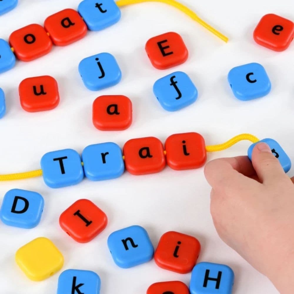 Alphabet Threading Beads,The Alphabet Threading Beads set is a vibrant and educational toy designed to engage children in the fun and interactive learning of letters and spelling. With its bright, chunky beads featuring both lower and uppercase letters, this set is a fantastic resource for reinforcing letter recognition, alphabet sequencing, and spelling skills. Key Features of the Alphabet Threading Beads: Colour-Coded for Learning: The beads are colour-coded, with vowels in red and consonants in blue, mak