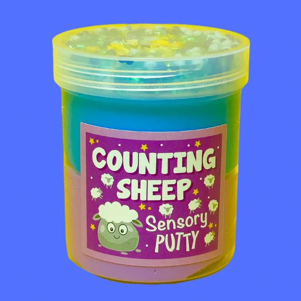 Counting Sheep Putty,Our Counting Sheep putty is designed to be the most relaxing experience yet! Infused with a gentle, soothing sweet blend scent, it offers a calming aroma that helps create a tranquil atmosphere. Topped with blue floam beads, shimmering blue bingsu beads, and a mixture of dreamy moon and star sprinkles, this putty creates a serene visual landscape that invites relaxation. The combination of blue and purple putty further enhances the calming effect, promoting a sense of peace and tranquil