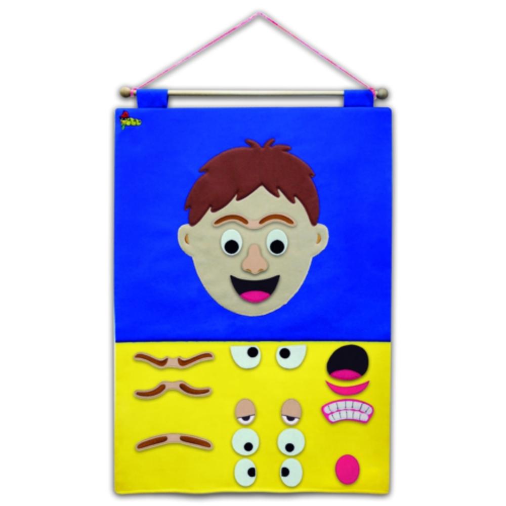 Create-A Face Chart Boy,The Create-a-Face Chart Boy is an engaging and interactive fabric wall chart designed to encourage children to explore and express different emotions and feelings through play. With a variety of attachable features that can be easily placed on the chart, children have the freedom to create a happy, sad, silly, or any other type of face they imagine. This versatility makes the chart a fantastic resource for discussions about feelings and emotions, helping children to understand and ar