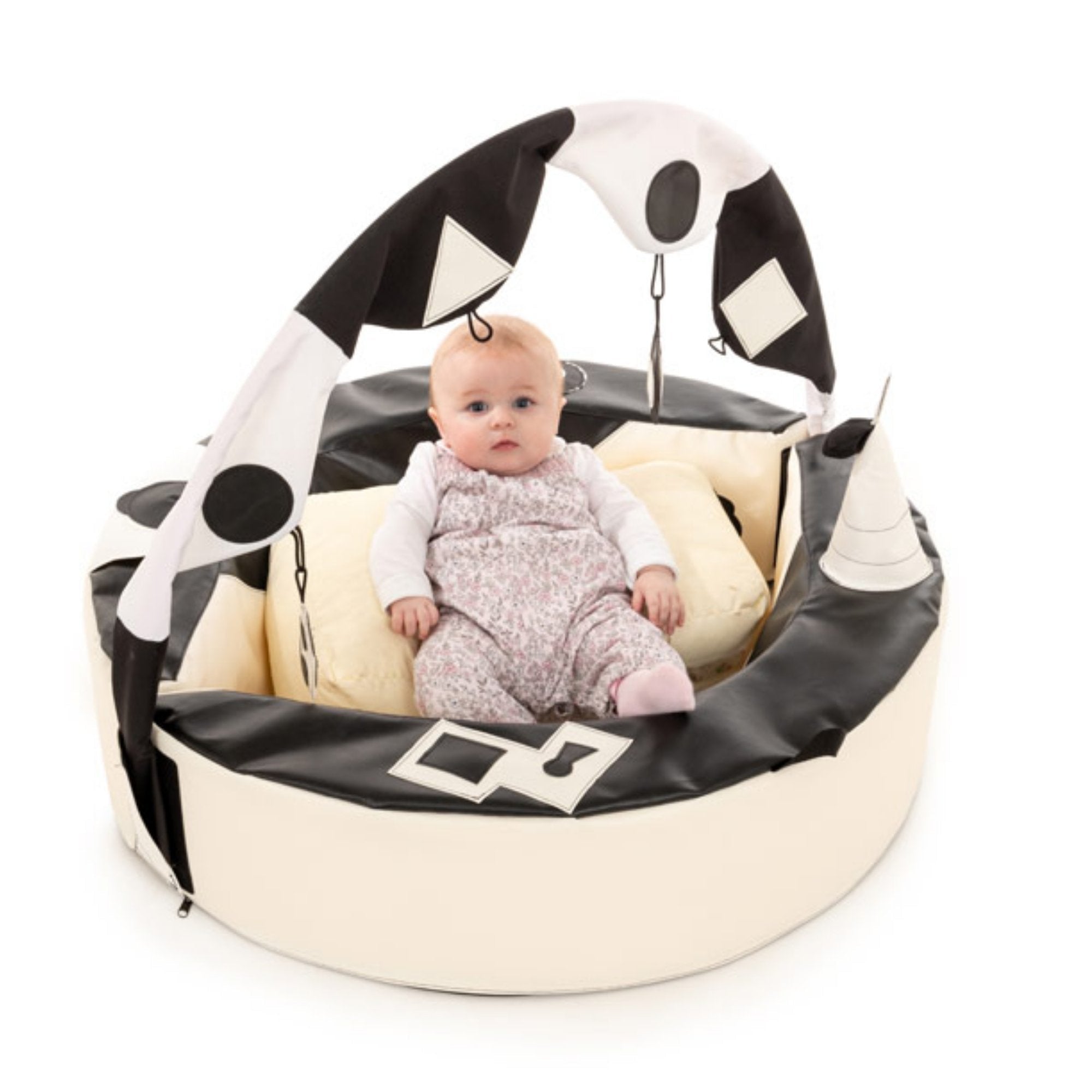 Crescent Ring With Activity Arch,The Crescent Ring with Activity Arch is superbly designed to help with early development. It surrounds a young baby with tactile, visual and sound stimulation, encouraging them to take notice and explore their surroundings. The soft foam walls offer interest and support to aid first sitting up. The addition of an arch creates a new dimension with two toys and extra clips to hang favourite toys directly within eye line and easy reach. Made in wipe clean PVC and washable cotto