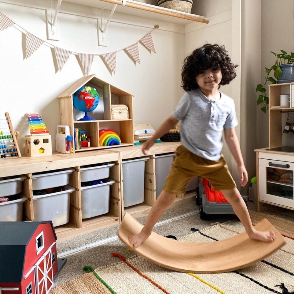 Curvy Balance Board,These Wooden Curvy Balance Boards do exactly what they say on the tin – the simplicity of the idea is what we love. Children can balance on the boards in many different positions – standing, lying or kneeling and when they are done with that, they can use it as a bridge to crawl under or pull their friend across the carpet. Such a simple idea, yet so much fun and so many variables! Your child develops: balancing, coordination, strength, gross motor skills, cognitive development, sensory 