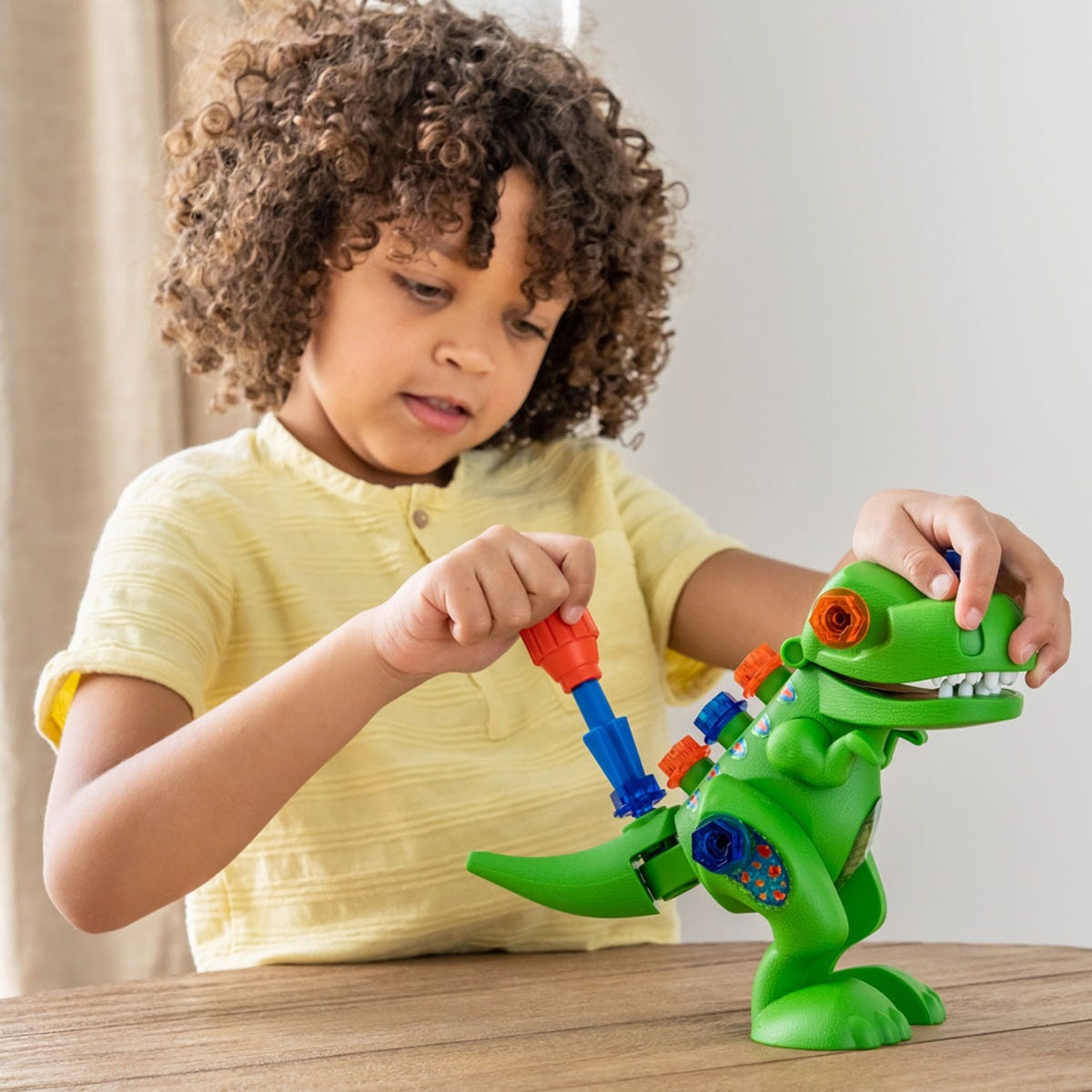 Design & Drill® Take-Apart T-Rex,Build your own T-rex with this dinosaur construction kit for preschoolers from Design & Drill®! Children use tools perfectly-sized for little hands to tinker with their very own dinosaur toy with moveable mouth and legs. Snap the 4 pieces together, and then use the kid-sized screwdriver to screw in the chunky, colourful bolts. Then head off into roar-some imaginative play with the Design & Drill Take-Apart T-Rex. Kids roar into creative play and build coordination skills as 