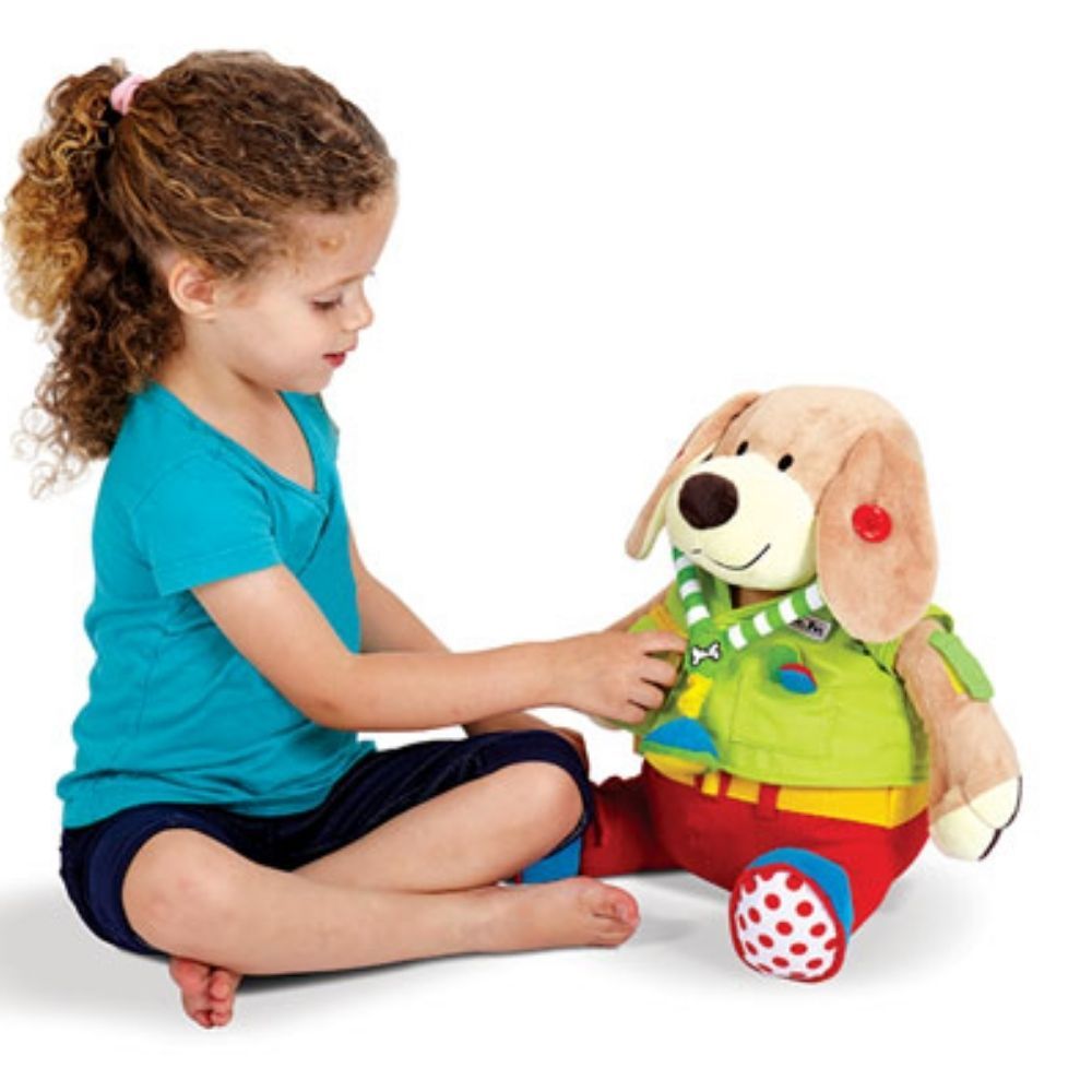 Edushape Dr Pooch,Edushape Dr Pooch Edushape Dr Pooch is an adorable, bright, and colourful educational toy designed to help children learn to manage various fasteners such as zips, laces, buttons, and Velcro. Dr. Pooch comes with a removable stethoscope that jingles, a zippered pocket containing a pen, lace-up shoes, and a removable jacket, making him an excellent companion for teaching fine motor skills and role-playing. Key Features: Interactive Learning: Teaches children how to manage buttons, zips, lac