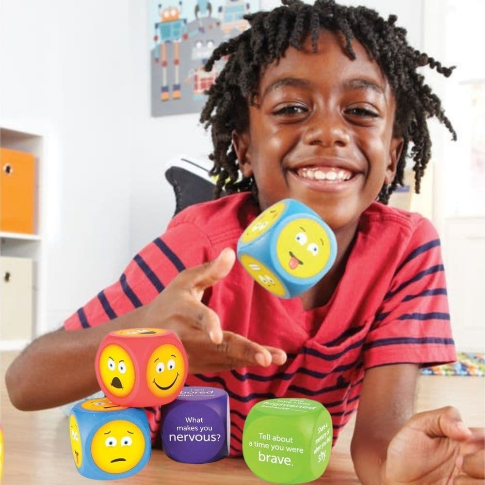 Emoji Cubes,The Emoji Cubes set is an innovative educational tool designed to enhance emotional literacy and self-awareness in early learners. This engaging set uses the universal appeal of emojis to help children identify and express their feelings, fostering both individual emotional growth and social skills. Key Features: Brightly Coloured Emoji Cubes: Each cube is vividly colored, making them visually appealing to young children and easy to engage with. Emoji and Written Prompt Cubes: The set includes t