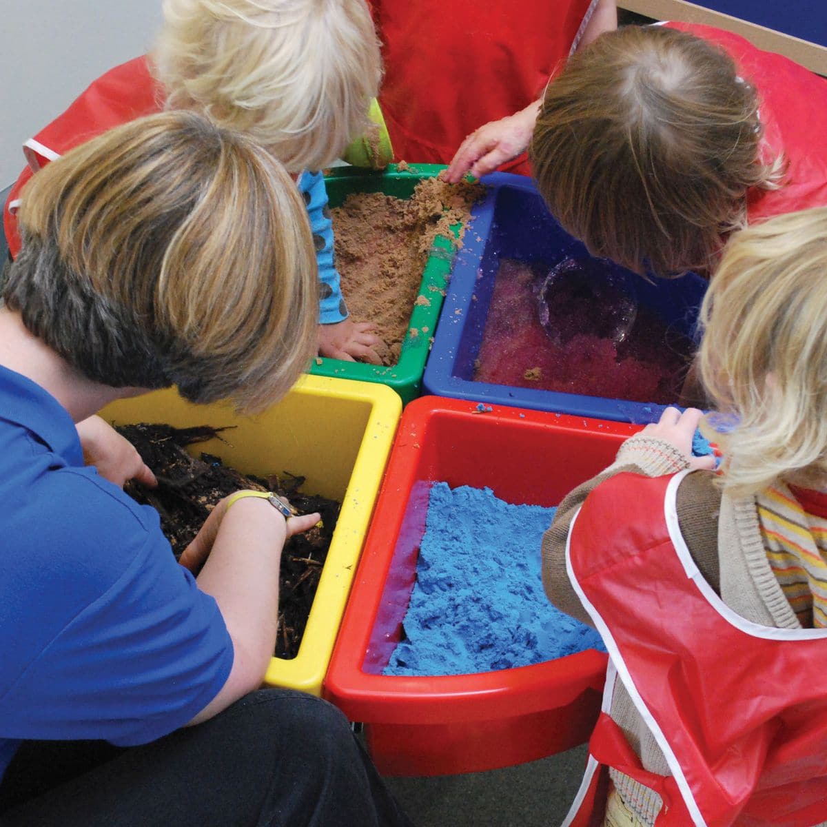 Exploration Circle Set Colour Trays,The Exploration Circle Set Colour Trays has 4 coloured quadrant trays with a grey metal stand forming a sturdy activity circle. Using the Exploration Circle Set Colour Trays,Children can play and discover the properties of sand, water, confetti, wood chippings or whatever medium you decide to place into the handy sized trays which are easy to manage, clean, lift and empty with this stunning Exploration Circle Set Colour Trays. The Exploration Circle Set Colour Trays is id