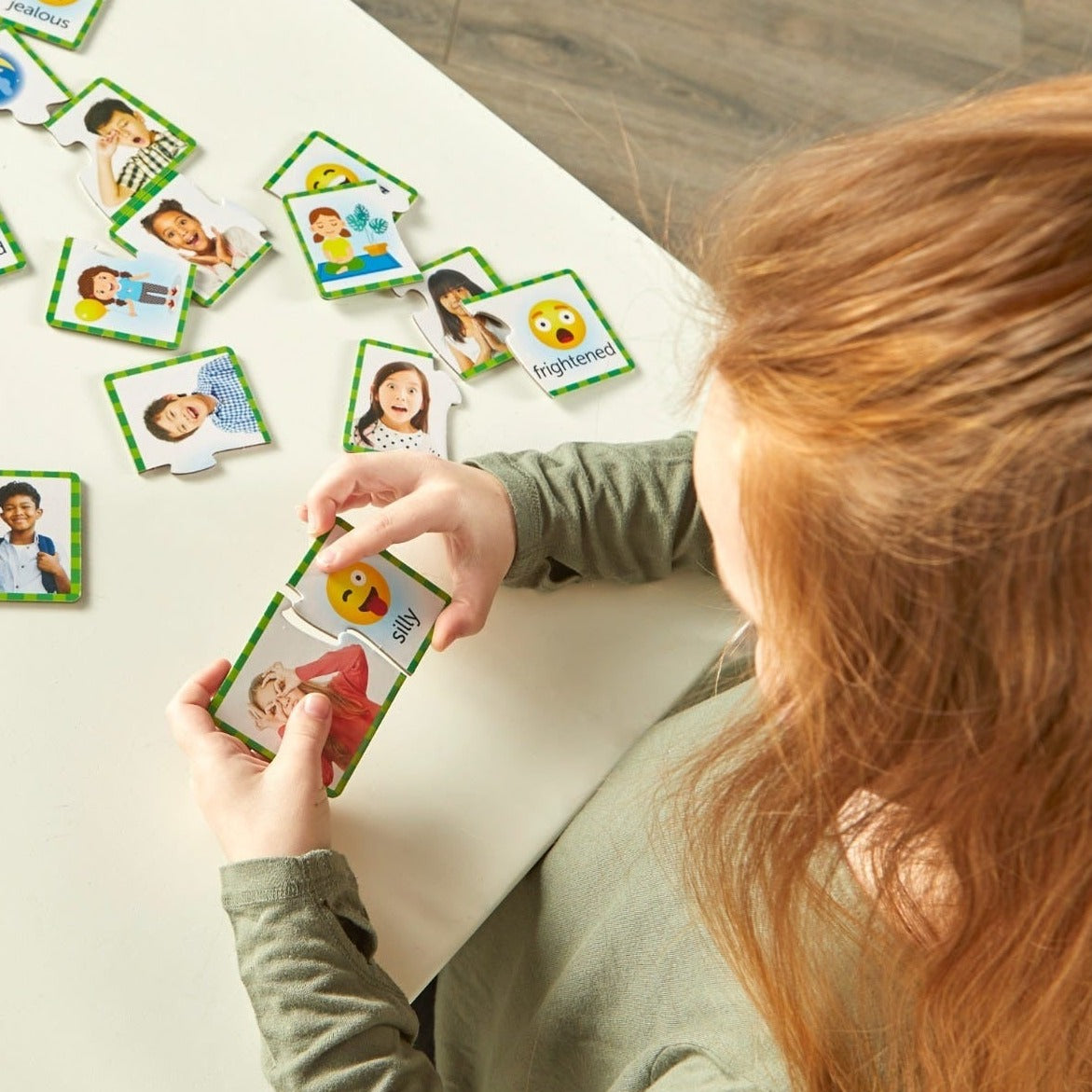 Feelings & Emotions Puzzle Cards,The Feelings & Emotions Puzzle Cards offer an engaging and educational way for preschoolers to explore social emotional learning (SEL) skills through play. These colorful, two-piece puzzles are designed to help young children identify and articulate their emotions effectively, enhancing their emotional intelligence from an early age. Key Features: Realistic and Relatable Images: Each puzzle features a full-color photograph of a real child expressing a specific emotion, paire