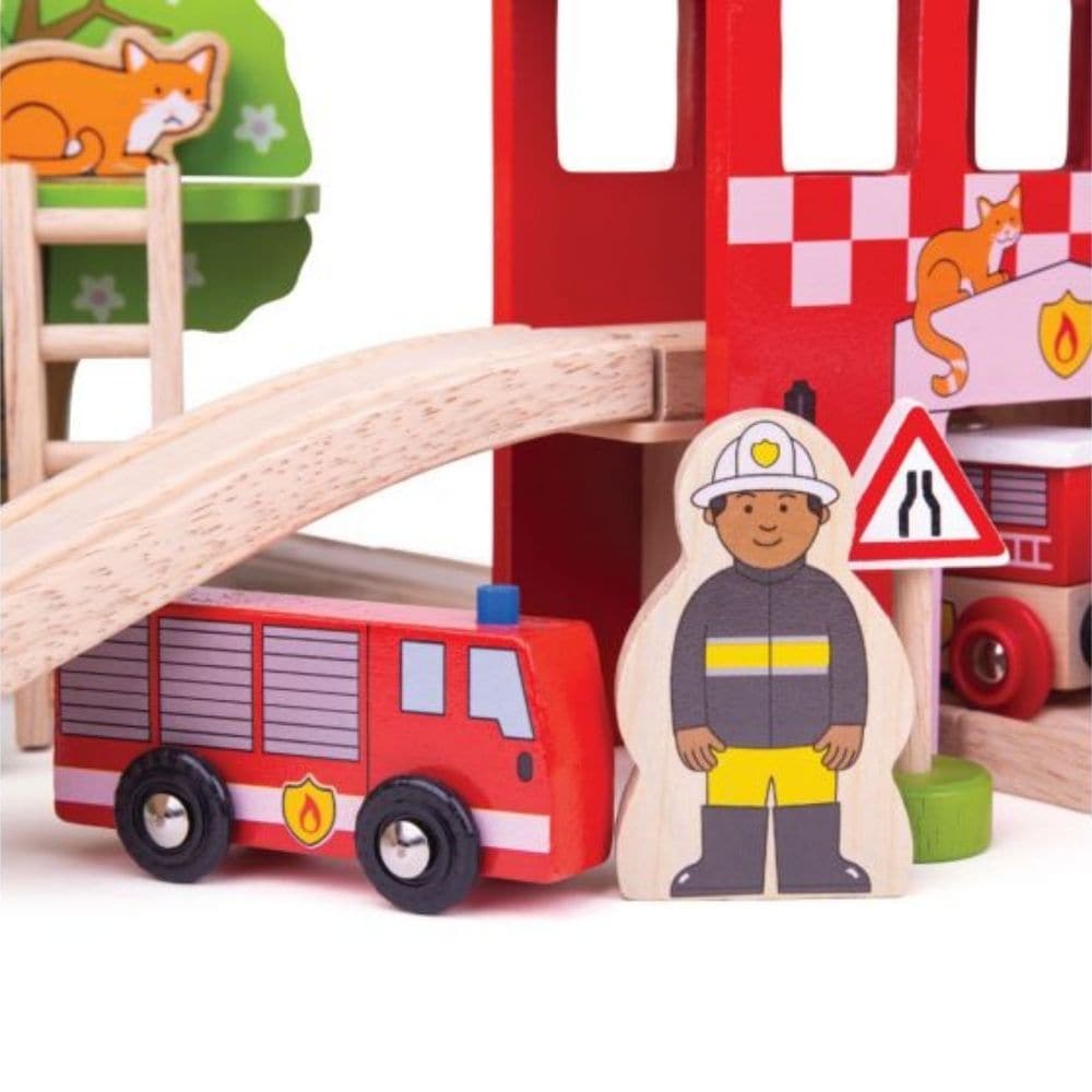 Fire Station Train Set,Fire Station Train Set: Race to the Rescue Race to the rescue with the Fire and Rescue Train Set! Whether your little one is fighting fires or rescuing a cat stuck in a tree, they can speed to the emergency using the fire rescue train and carriages with removable loads. Features and Benefits: Engaging and Imaginative Play Interactive Play: Speed through the fire station tunnel, past road signs, and straight to the emergency with two firefighters ready to climb the ladder or use the fi