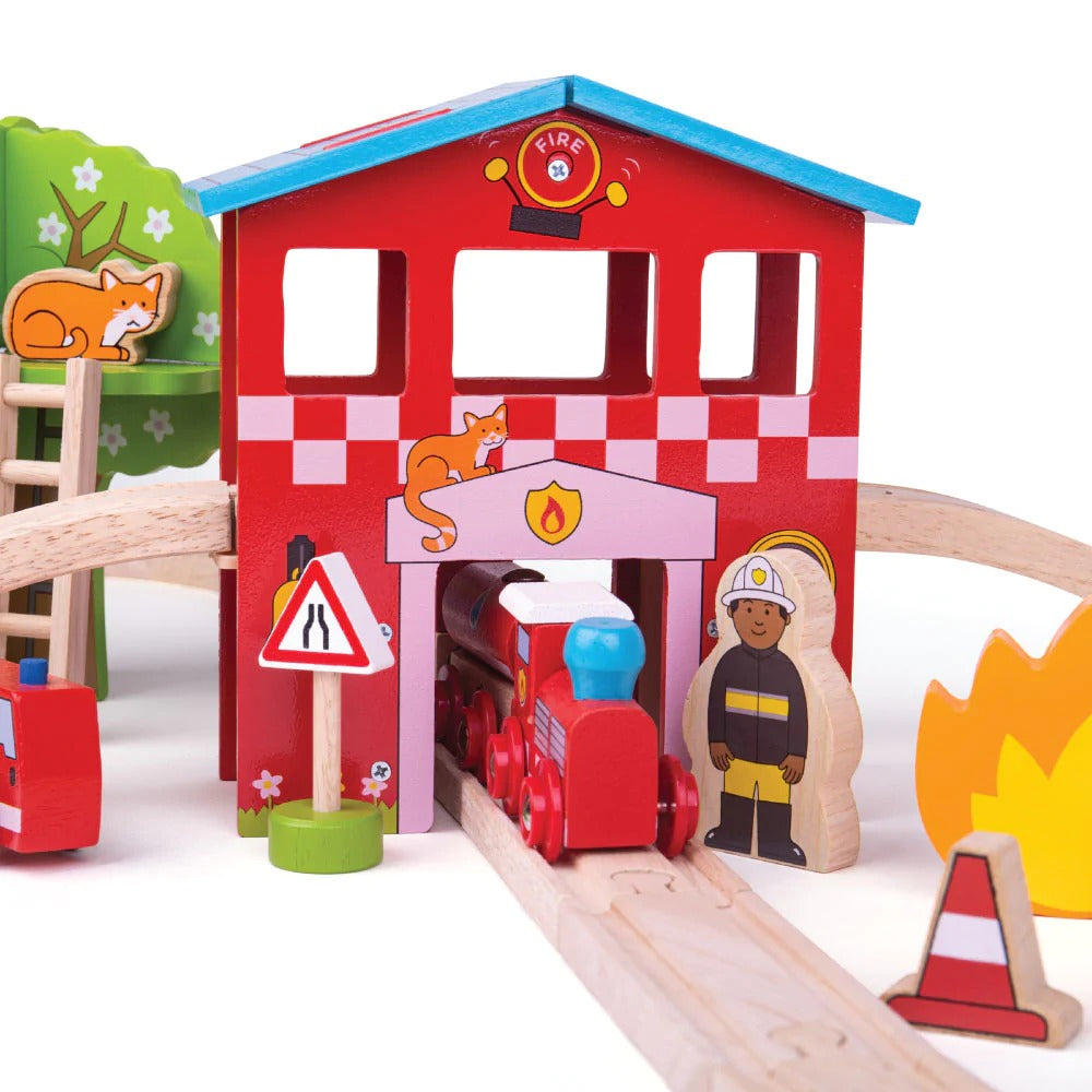 Fire Station Train Set,Fire Station Train Set: Race to the Rescue Race to the rescue with the Fire and Rescue Train Set! Whether your little one is fighting fires or rescuing a cat stuck in a tree, they can speed to the emergency using the fire rescue train and carriages with removable loads. Features and Benefits: Engaging and Imaginative Play Interactive Play: Speed through the fire station tunnel, past road signs, and straight to the emergency with two firefighters ready to climb the ladder or use the fi