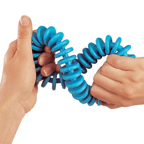 Flexi Ring,The Tactile Flexi Ring is a wonderfully designed sensory tool that offers both tactile stimulation and physical benefits to its users. This easy-to-grasp ring is ideal for anyone needing to engage their hands in sensory play. Features of the Tactile Flexi Ring: Tactile Stimulation: The Flexi Ring is specifically crafted to enhance tactile awareness, with its unique texture and flexible material that encourages continuous exploration. Muscle Development: Regular use of the Flexi Ring helps in stre