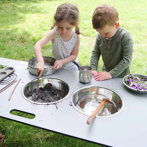 Folding Mud Kitchen,NEW folding Mud Kitchen - The Ultimate accompaniment to messy play inside and out Taking the basic design principles of our popular lightweight folding table and utilising the unique fail-safe folding mechanism, we have developed the new folding mud kitchen with an extremely durable, hard-wearing and weather resistant top. Featuring smart imaginary hot plates and two holes in the table top to house the supplied stainless steel bowls, the revolutionary folding mud kitchen provides a great