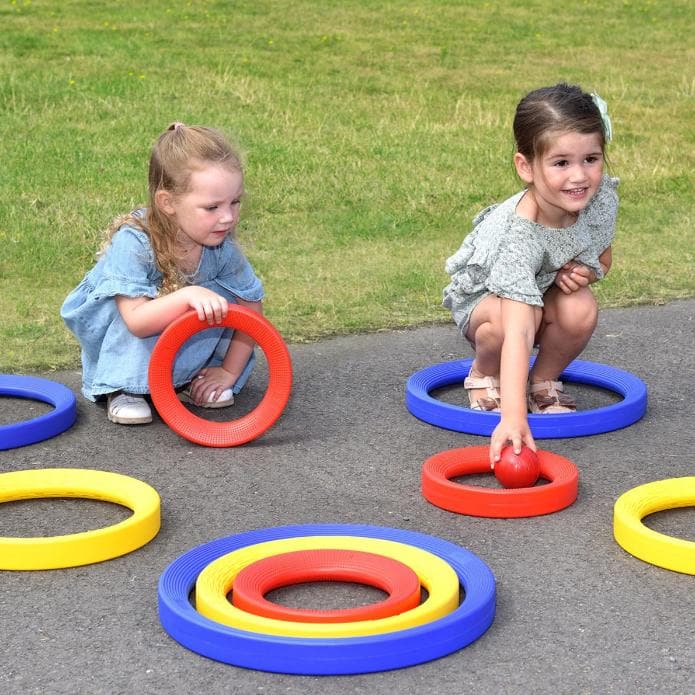 Giant Plastic Activity Rings Set,Introduce a vibrant and engaging learning tool into your child's playtime with the Giant Plastic Activity Rings Set. This set includes nine high-quality plastic rings in three distinct sizes—small, medium, and large—each colour-coded for easy recognition and comparison. Designed to stimulate both physical and cognitive development, these rings are perfect for children aged 12 months and older. Whether used indoors or outdoors, the Giant Plastic Activity Rings Set offers endl