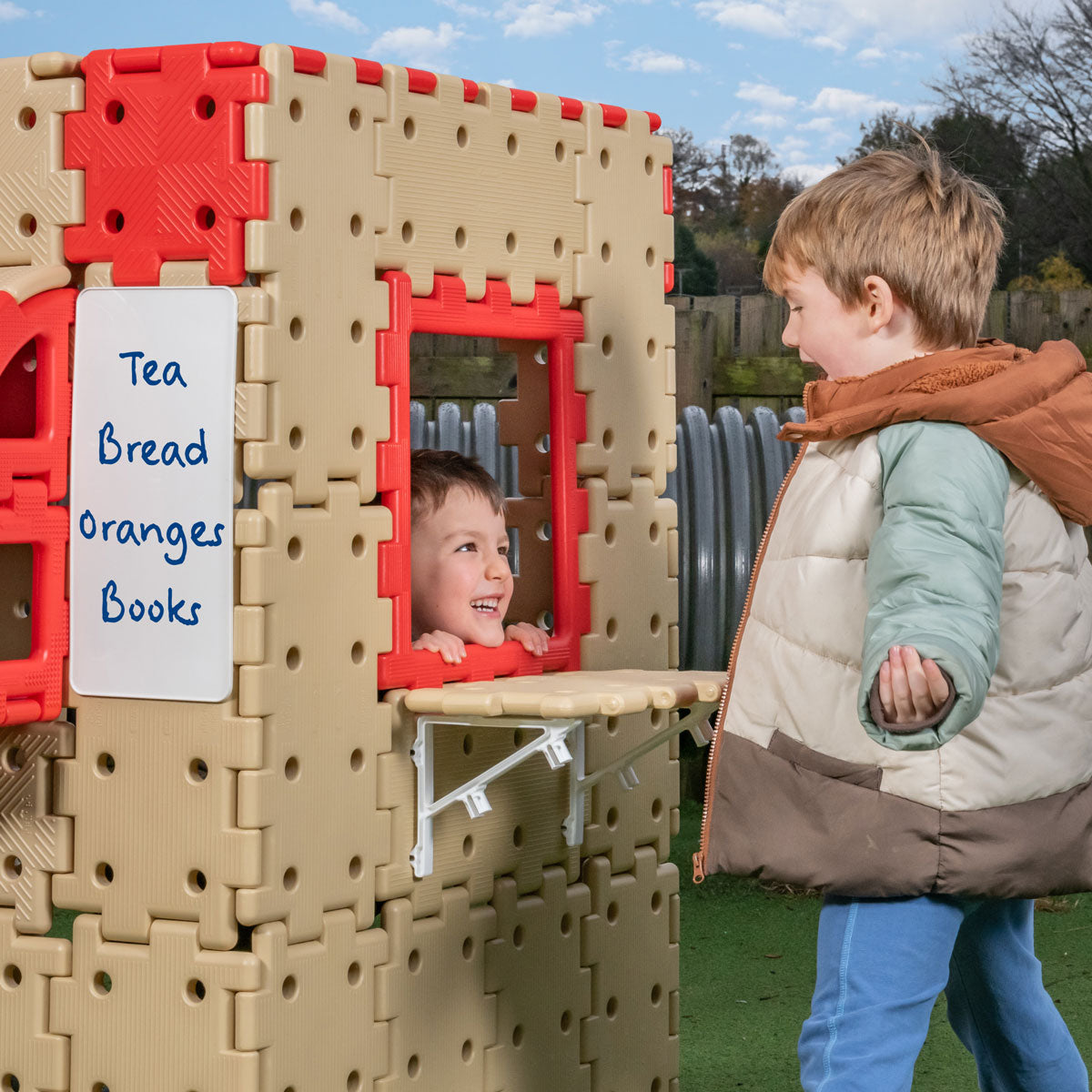 Giant Polydron Build-A-Shop,Introducing the Giant Polydron Build a Shop - a perfect combination of role play and construction for children! Watch as their imagination runs wild while they create their very own shop with this fun and engaging activity.With just one set, your little ones can design a variety of shops, limited only by their creativity. Whether it's a bakery, a toy store, or a flower shop, the possibilities are endless!Featuring customizable windows on the side, your child can create a vibrant 