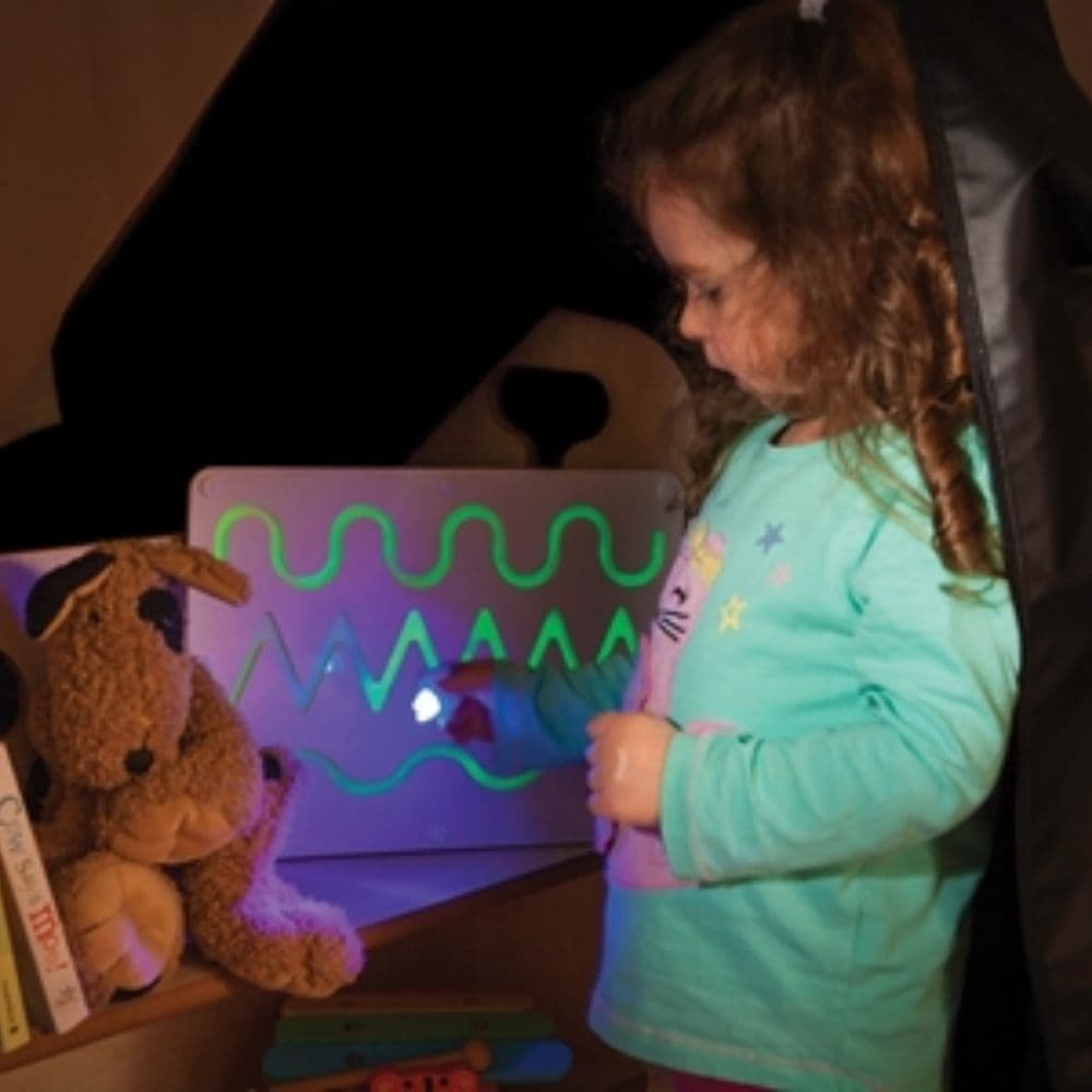 Glo Board Hills Valley & River,Embark on a sensory journey with the Glo Board Hills Valley & River, a magical educational tool that combines visual intrigue with tactile interaction. This board is crafted from a polymer-based material embedded with glow crystals, creating an enchanting effect that captures the imagination of children while supporting key developmental skills. Perfect for sensory play, the Glo Board Hills Valley & River offers a unique feature: use the included UV Glo pen to follow the shape