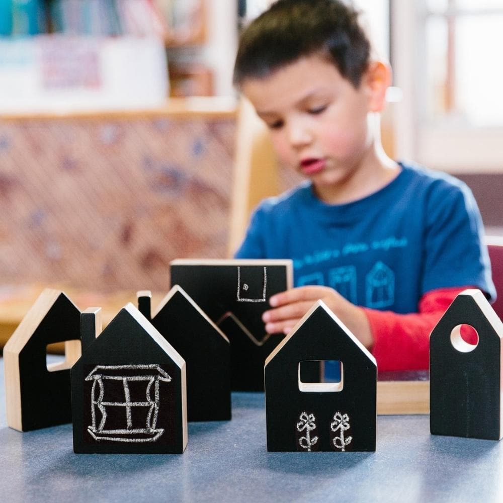 Happy Architect Chalkboard Create And Play Village - Pack Of 28,The Happy Architect Chalkboard Create and Play Village is a creative, open-ended construction set.Build and create your own village with this chalkboard Happy Architect set.With a blackboard surface on one side to encourage children to use their imagination and explore a whole new world of their own, decorating one side as they choose, or practicing their words by naming buildings with words like library, school and home.The pieces slot easily 