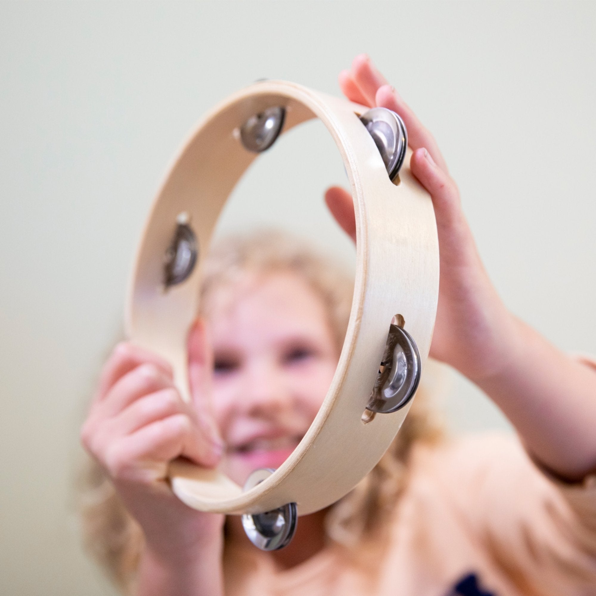 Headless Tambourine 5 Pairs Jingle,Introduce your child to the joy of music with our Headless Tambourine! Crafted with a wooden rim and boasting 5 pairs of jingles, this tambourine is perfect for little hands eager to explore rhythm and sound. Here's why it's a fantastic choice for budding musicians: Interactive Fun: Children will delight in creating an array of sounds with this tambourine, fostering their sense of rhythm and timing while encouraging imaginative play. Skill Development: As an ideal first mu