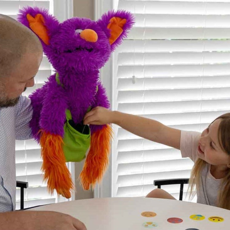 Interactive Edgar The Emotions Puppet,Introduce your children to Interactive Edgar The Emotions Puppet, a uniquely designed educational tool that makes learning about emotions fun and engaging. Edgar is not just a puppet; he is a vibrant character with super-soft fur and a silly face, created to help children express and understand their own emotions. Suitable for children aged 3 and up, Edgar serves as a gentle intermediary for discussions about feelings. This puppet comes with a bright green pouch contain