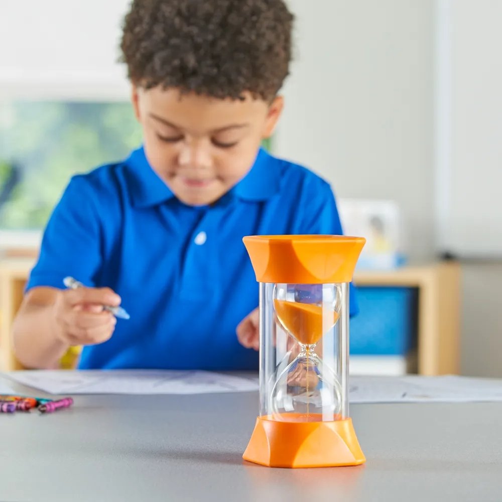 Jumbo Sand Timer (5-Minute),This colourful Jumbo Sand Timer is ideal for use in the classroom or at home to give children a visual representation of the passing of 5 minutes. Its oversized and sturdy, making it great for little hands.The rubber endcaps give the timer greater durability and allow for quiet pausing of the timer. The mesmerising motion of the colourful orange sand is ideal for a calm-down area in the classroom or at home. Great for showing the passing of approximately 5 minutes. (Please note t