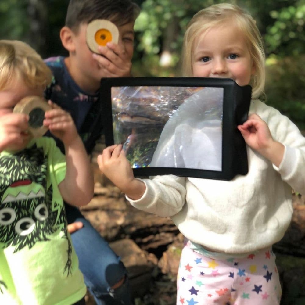 Large Sheet Magnifier,Easy to use Large Sheet Magnifier ideal for small hands. The Large Sheet Magnifier is low cost and easy to store and provides pp to 3x magnification. The Large Sheet Magnifier is great for use indoors for practical reasons such as reading or just as great for using in play outdoors to inspect bugs and plants up close. The Large Sheet Magnifier Supports the following areas of learning: Understanding the World - observation Understanding the World - exploration Personal Development - col