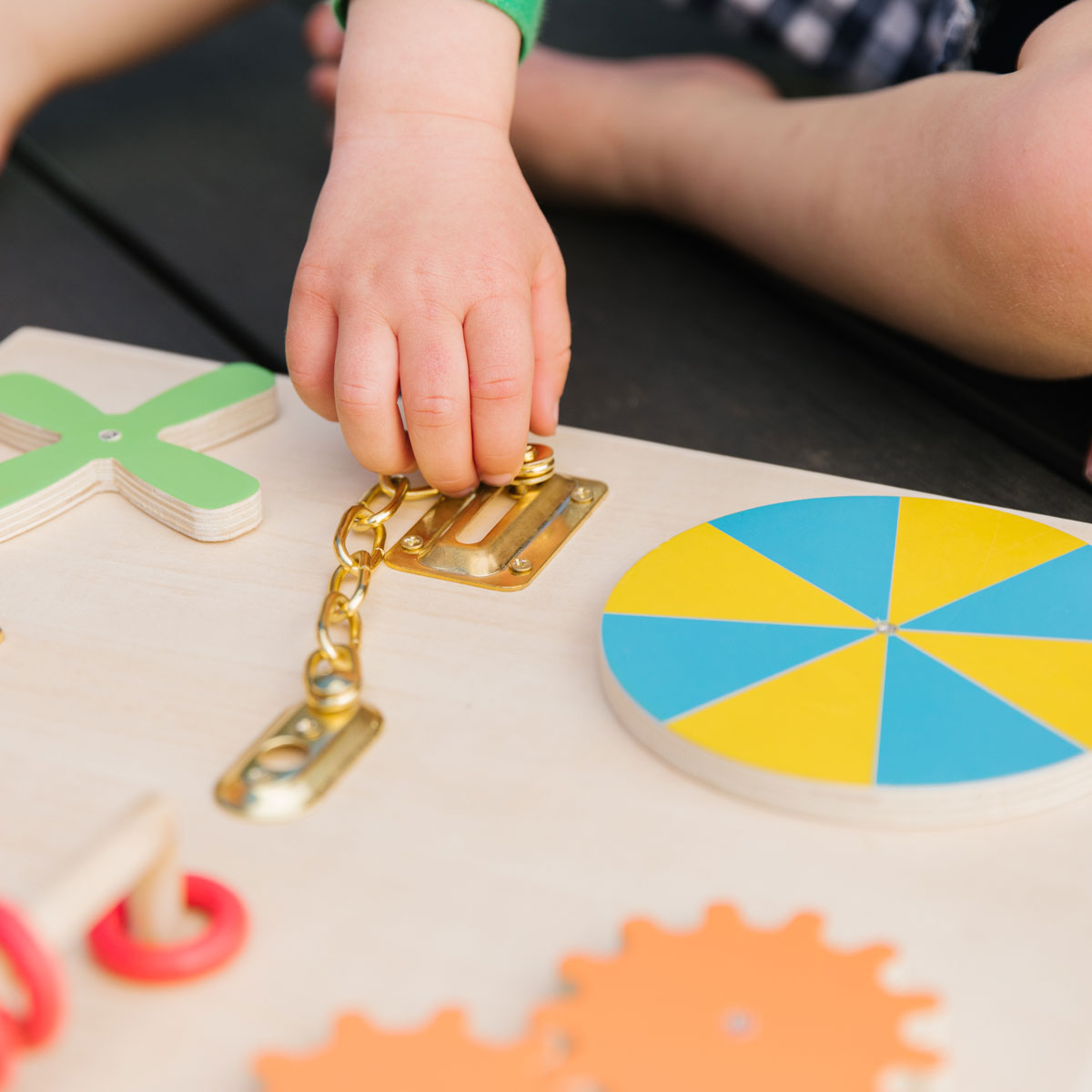 Learning With Senses,Introduce your child to the captivating world of sensory exploration with our Learning with Senses Sensory Play Board. This dynamic educational tool is designed to stimulate the senses and boost cognitive development through hands-on play. Its robust construction and thoughtful design make it a standout addition to any child's toy collection. Features of the Learning with Senses Sensory Play Board: Interactive Elements: With features that include opening and closing compartments, lockin