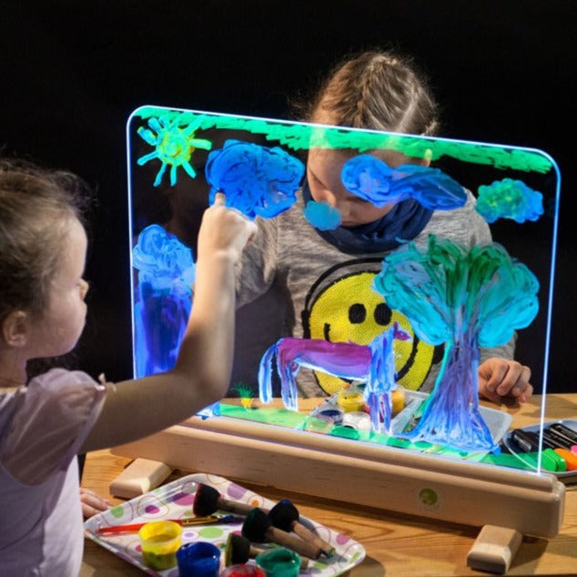 Magic Light Easel,The Magic Light Easel has magic tempered glowing glass on which you can paint on. Control unit of the device allows you to select from the range of 16 colours of the base lighting and every time create a new masterpiece. You can create a different impression of your piece of art only by changing the lighting. So, you should not immediately wipe out the landscapes you have created – change the colour and enjoy undiscovered ornaments of the drawing. Unlike a paper drawing that cannot be eras