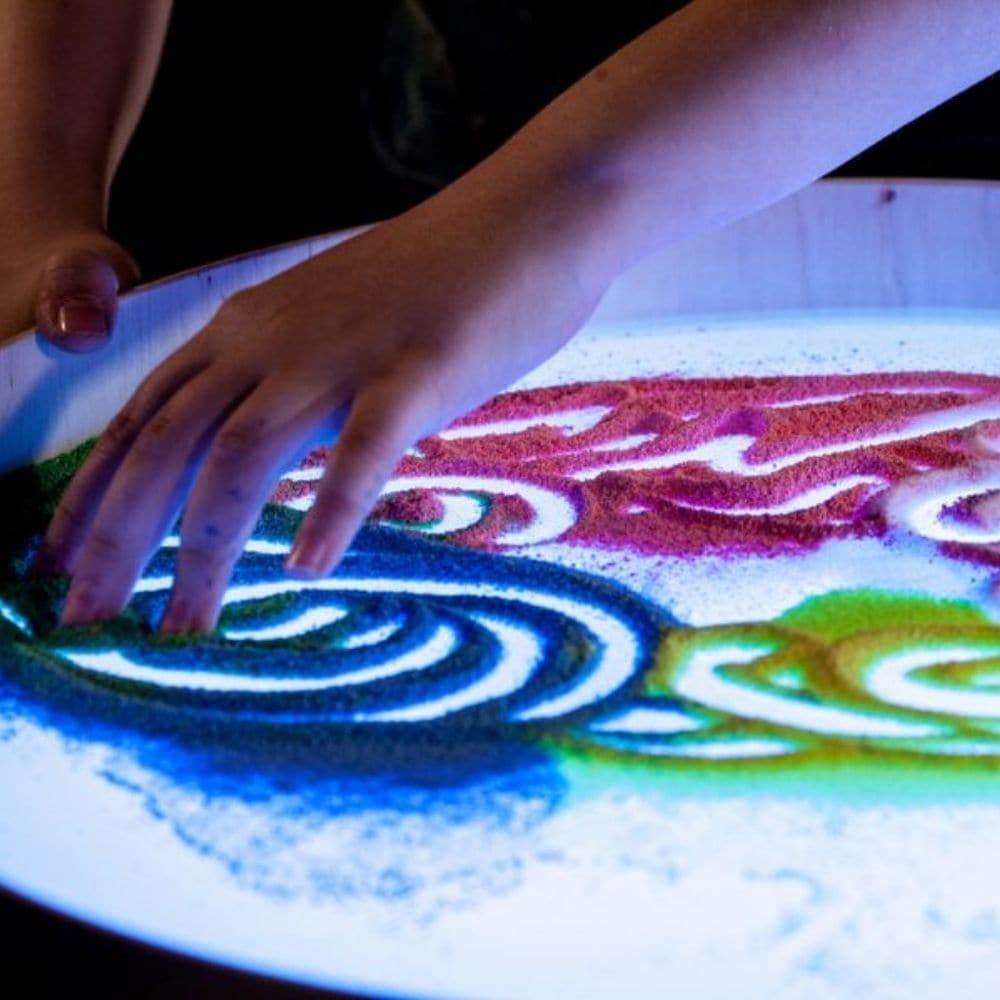 Magic Light Table,Introducing the Magic Light Table, a versatile and engaging tool for children's games, art projects, and therapeutic activities. This compact, lightweight table is designed with a high edge to keep materials like sand and semolina contained while children create and explore. Key Features of the Magic Light Table: Vibrant Lighting Options: Equipped with LED RGB diodes, the table offers 16 different colours and four automatic colour change programs, adding a dynamic element to play and creat