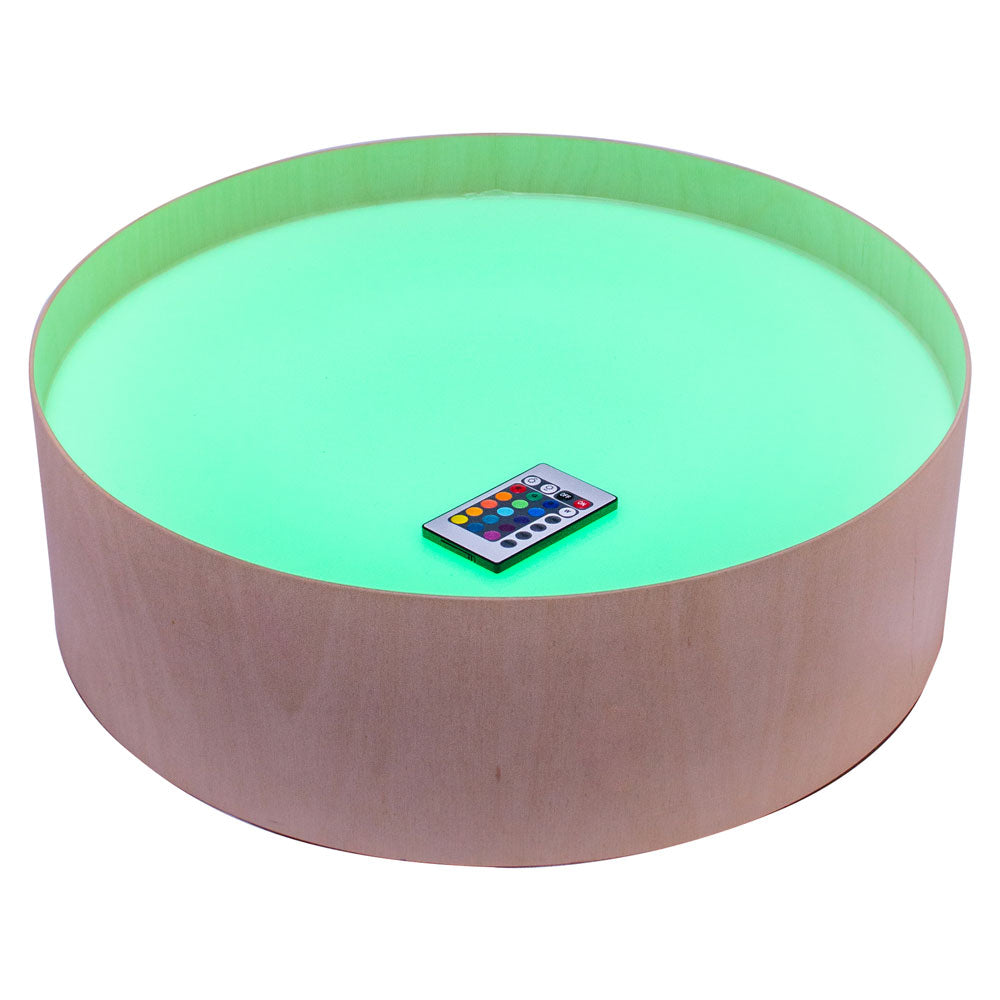 Magic Light Table,Introducing the Magic Light Table, a versatile and engaging tool for children's games, art projects, and therapeutic activities. This compact, lightweight table is designed with a high edge to keep materials like sand and semolina contained while children create and explore. Key Features of the Magic Light Table: Vibrant Lighting Options: Equipped with LED RGB diodes, the table offers 16 different colours and four automatic colour change programs, adding a dynamic element to play and creat