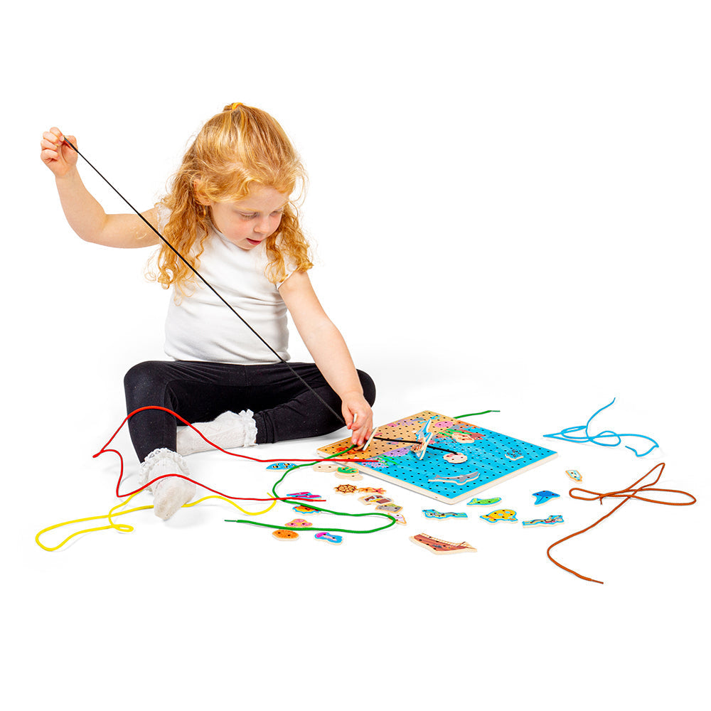 Marine Lace-A-Shape,Ready for an under the sea adventure? Thread the laces through the marine shapes and onto the baseboard to create an exciting sea scene. Wooden threading toys are a fun way to develop kids’ hand-eye coordination, fine motor and sequencing skills. Our Marine Lacing Game For Toddlers features 30 different marine-inspired shapes and six different coloured laces. Youngsters need to simply thread the laces through the shapes and onto the baseboard to create a picture. Made from high quality, 