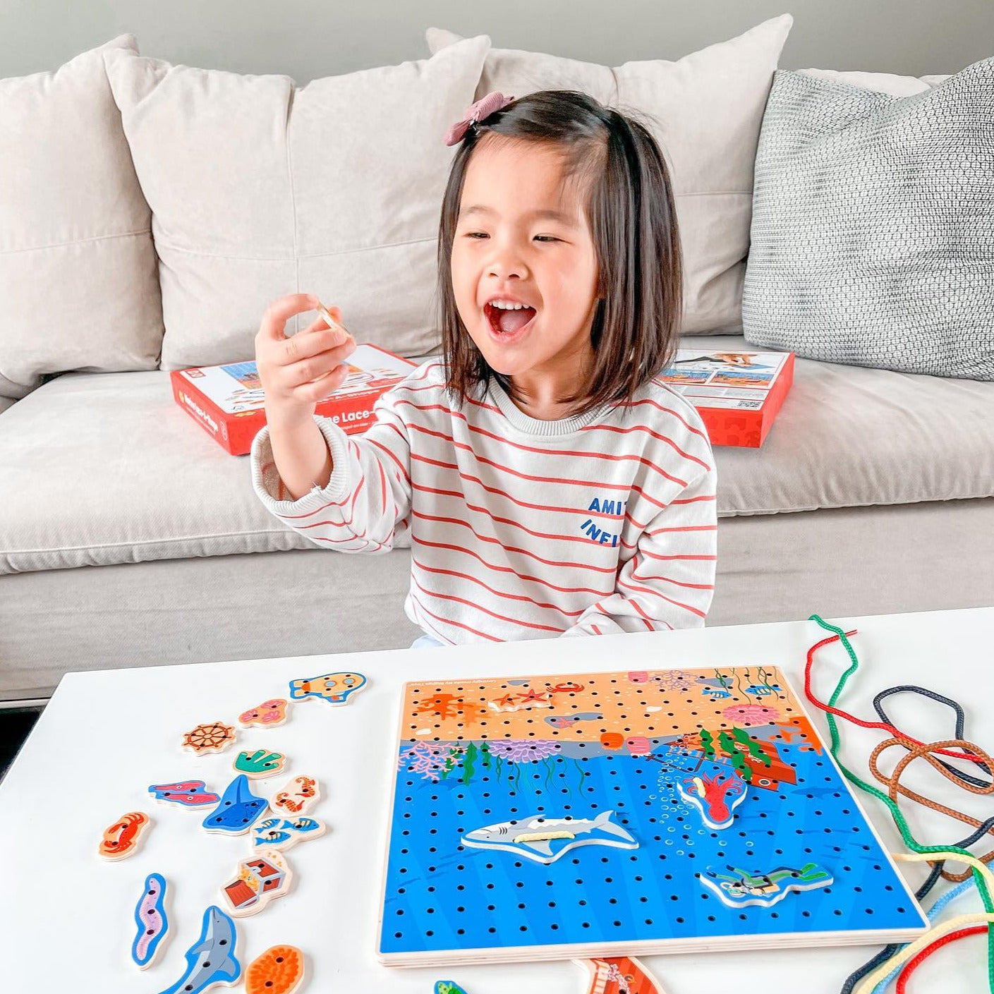 Marine Lace-A-Shape,Ready for an under the sea adventure? Thread the laces through the marine shapes and onto the baseboard to create an exciting sea scene. Wooden threading toys are a fun way to develop kids’ hand-eye coordination, fine motor and sequencing skills. Our Marine Lacing Game For Toddlers features 30 different marine-inspired shapes and six different coloured laces. Youngsters need to simply thread the laces through the shapes and onto the baseboard to create a picture. Made from high quality, 