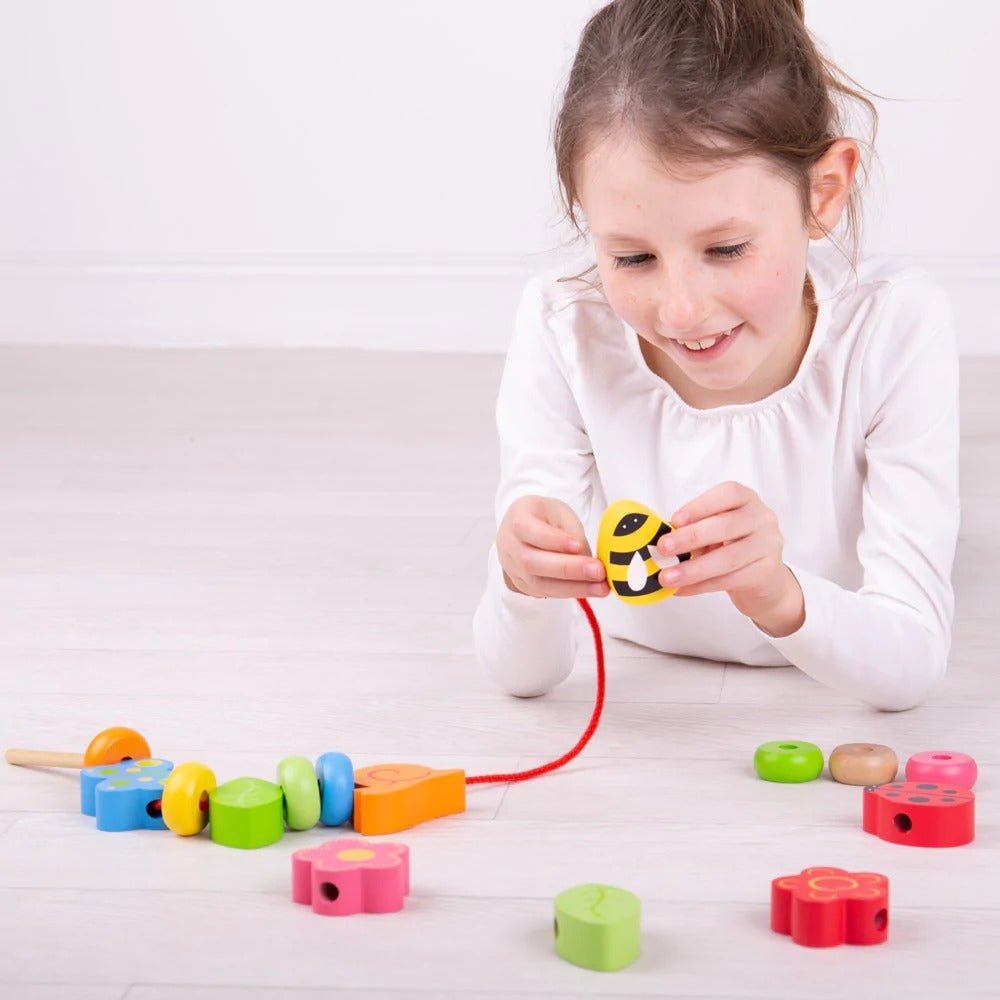 Nature Lacing Beads,These delightful wooden Nature Lacing Beads, in multiple shapes and colours, are a bold way to learn and practise lacing, counting, sorting and shape and colour recognition. The 16 beads include a variety of nature-inspired shapes including flowers, insects and leaves. The Nature Lacing Beads is a great first beading set, the beads are chunky and easy for little hands to grasp, hold, arrange, rearrange, stack and knock down. The Nature Lacing Beads set comes complete with one thick, long