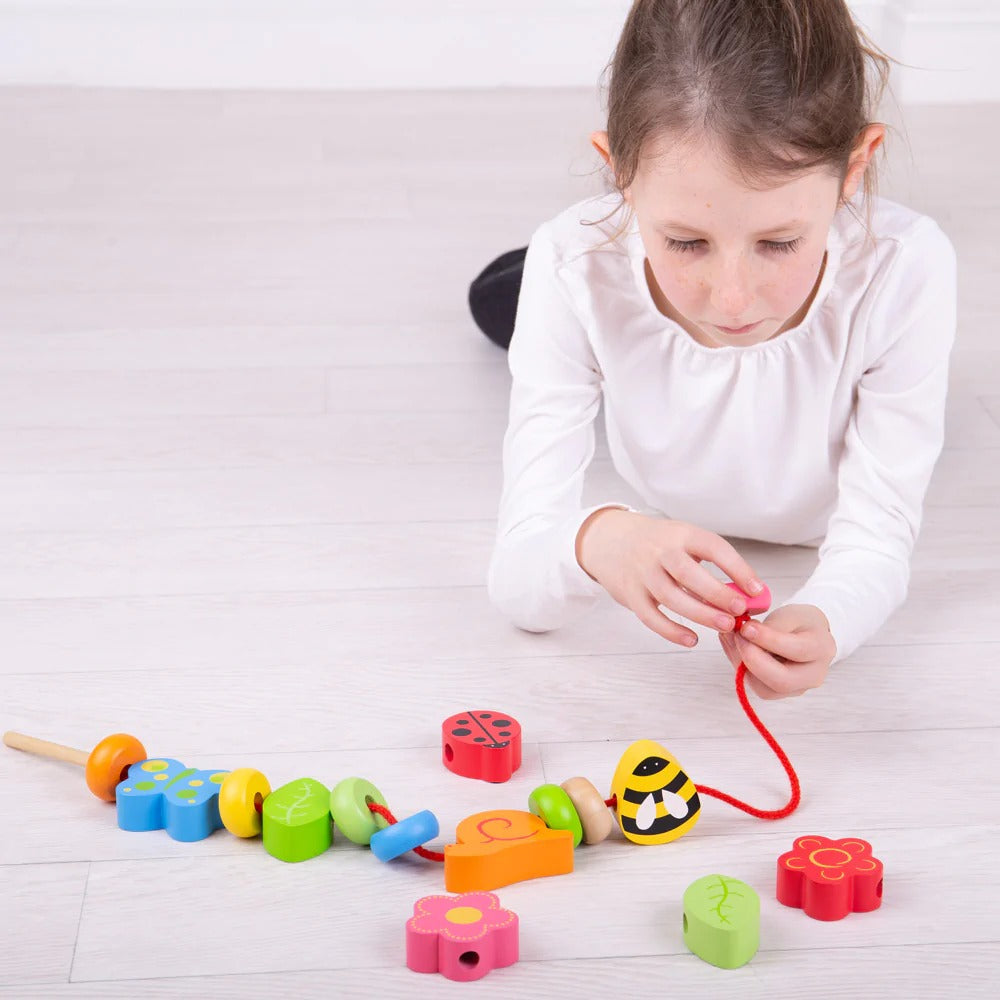 Nature Lacing Beads,These delightful wooden Nature Lacing Beads, in multiple shapes and colours, are a bold way to learn and practise lacing, counting, sorting and shape and colour recognition. The 16 beads include a variety of nature-inspired shapes including flowers, insects and leaves. The Nature Lacing Beads is a great first beading set, the beads are chunky and easy for little hands to grasp, hold, arrange, rearrange, stack and knock down. The Nature Lacing Beads set comes complete with one thick, long