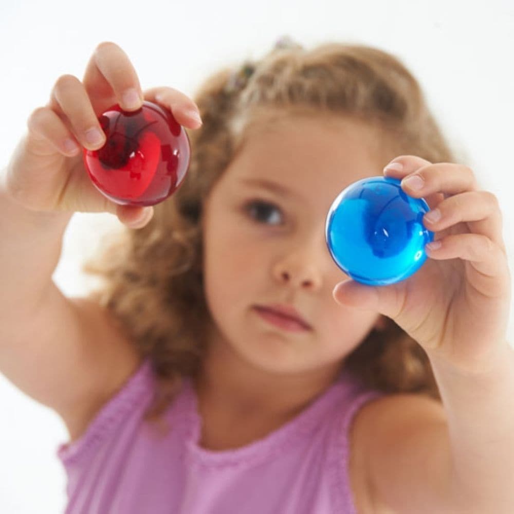 Perception Spheres Pack Of 8,The Perception Spheres come in eight different clear colours and are soft and warm to the touch. The very youngest children will enjoy handling the Perception Spheres in free sensory play or a part of a Treasure Basket collection. Older children will find the Perception Spheres fascinating as they hold them up and look through them seeing the world around them in different colours. The way light behaves when children look through the Perception Spheres they will also see the wor