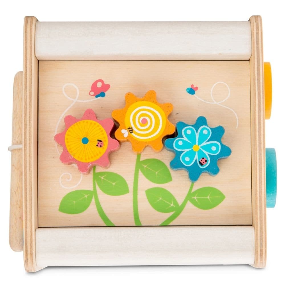 Petit Activity Cube,The Petit Activity Cube is a delightful and versatile wooden toy designed to engage and entertain toddlers with its array of stimulating activities. Here's why it's the perfect choice for curious little minds: Multi-functional compact design: This petite activity cube packs a punch with its variety of activities, including a door to open, spinning wheel, ABC/123 flaps, xylophone, spinning gears in a flower motif, and two birds sliding across an autumn tree. Each side offers a new and exc