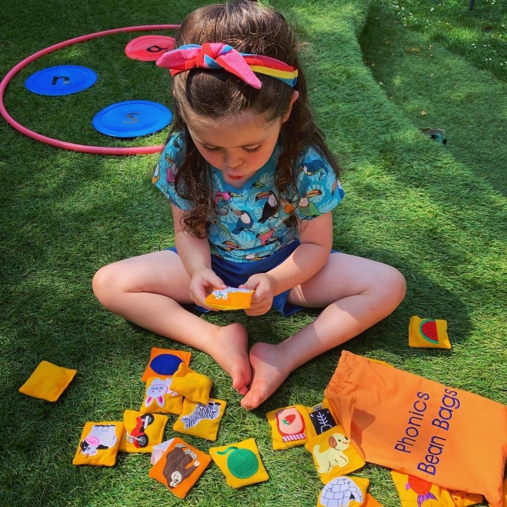 Phonics Bean Bags,These colourful 9cm embroidered Phonics bean bags provide an engaging and tactile way to reinforce letters and sounds, making phonics learning fun and interactive. Here's why they're a fantastic addition to any educational setting: Comprehensive phonics reinforcement: Each Phonics bean bag features an appealing picture representing a specific letter sound, helping children associate letters with their corresponding sounds. Additionally, special double-sided bean bags are included for short