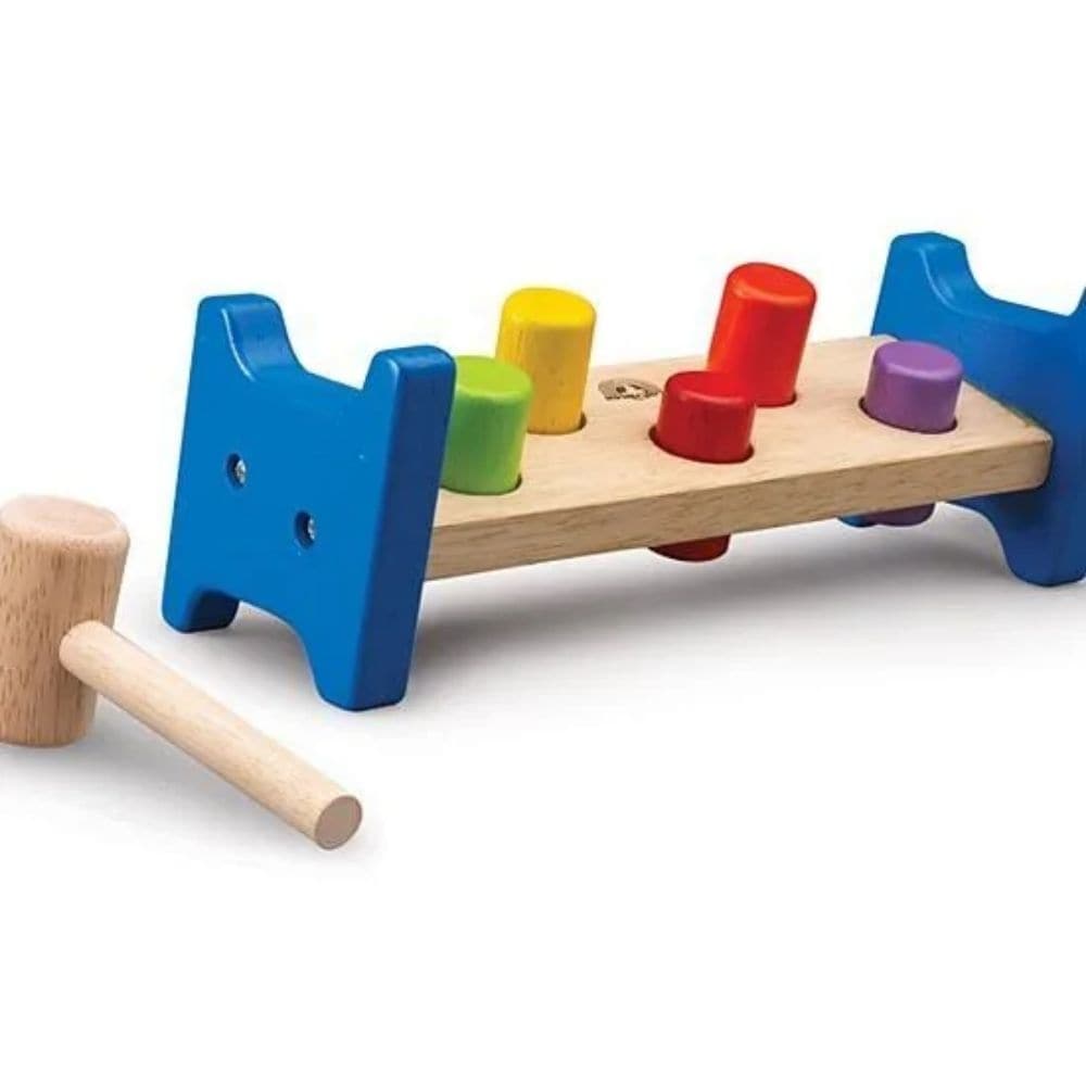 Pound A Peg Play,Grab your toy tools and get ready for some fun! The Pound a Peg wooden hammer bench is a great motor development toy and is a high quality classic toy, perfect for toddlers. This young kids activity toy is also a great way to fine tune motor development and logic. The brightly coloured pegs fit snuggly into the smooth-sanded wooden base. Match up the vibrant pegs and pound away with the included mini hammer. Then flip the base over, and hammer this toddler activity toy all over again! Helps