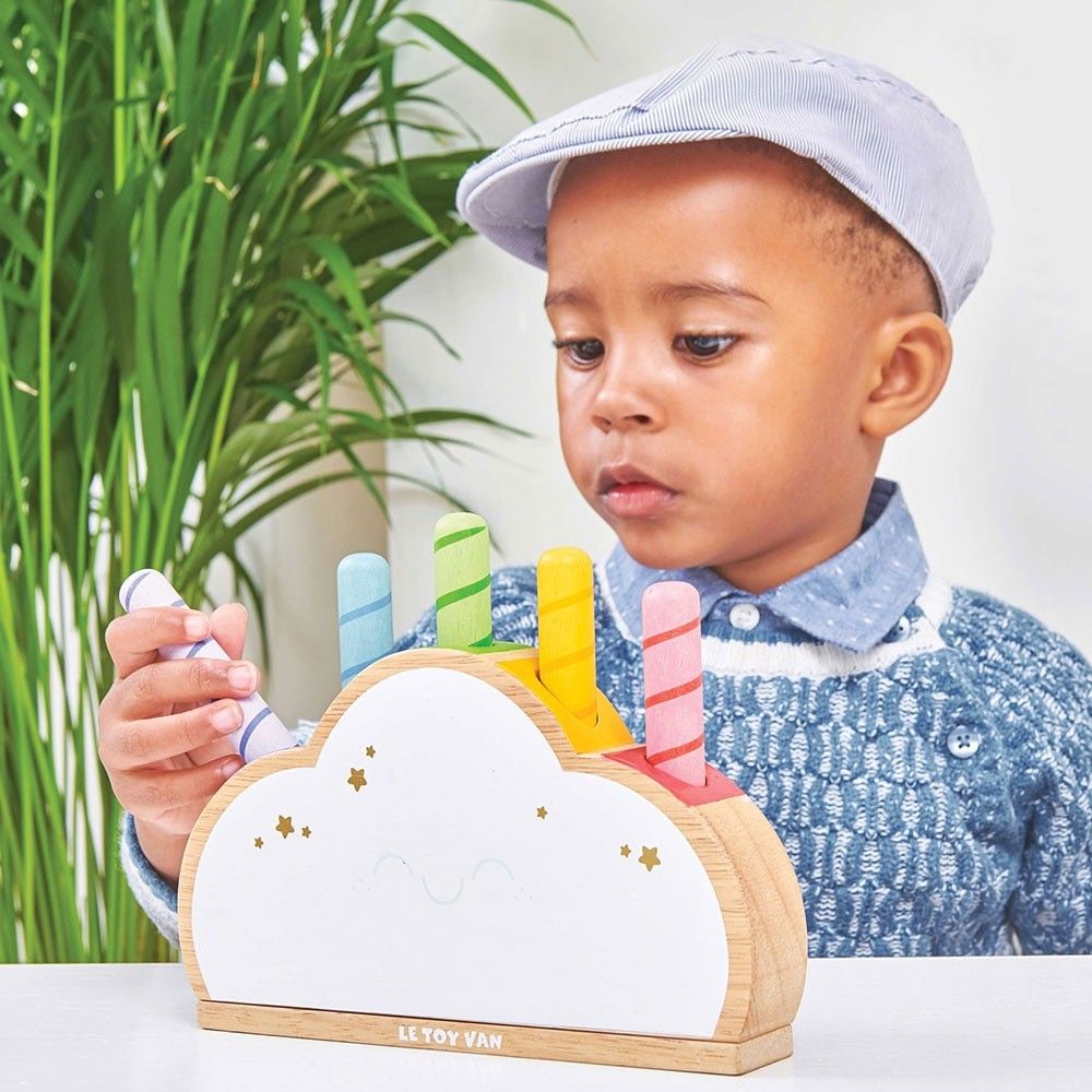 Rainbow Cloud Pop,Rainbow Cloud Pop Get ready for some popping good fun with the Rainbow Cloud Pop game! This classic interactive, spring-loaded wooden toy features five colourful rainbow pop-up rods in three different heights, offering endless entertainment for little ones and the whole family. Key Features: Interactive Play: Push down the rods, wait for them to pop, and try to catch them before they drop. A fun and engaging game that guarantees old-fashioned fun for all ages. Colourful Design: Made from s