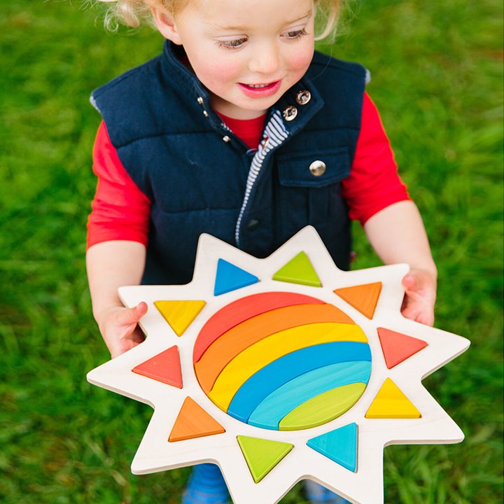 Rainbow In The Sun,The Rainbow in the Sun is made of sturdy wooden material which ensures durability and long-lasting playtime for little ones. The vibrant colours and adorable sun shape make this puzzle a fun addition to playtime while still providing educational benefits. Not only will your child have fun matching colours and shapes, but they'll also be developing critical thinking skills as they solve the puzzle. The Rainbow in the Sun puzzle's size is perfect for little hands to grasp and manipulate, en