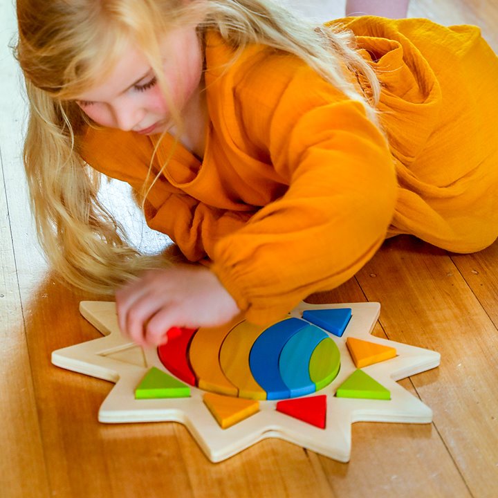 Rainbow In The Sun,The Rainbow in the Sun is made of sturdy wooden material which ensures durability and long-lasting playtime for little ones. The vibrant colours and adorable sun shape make this puzzle a fun addition to playtime while still providing educational benefits. Not only will your child have fun matching colours and shapes, but they'll also be developing critical thinking skills as they solve the puzzle. The Rainbow in the Sun puzzle's size is perfect for little hands to grasp and manipulate, en